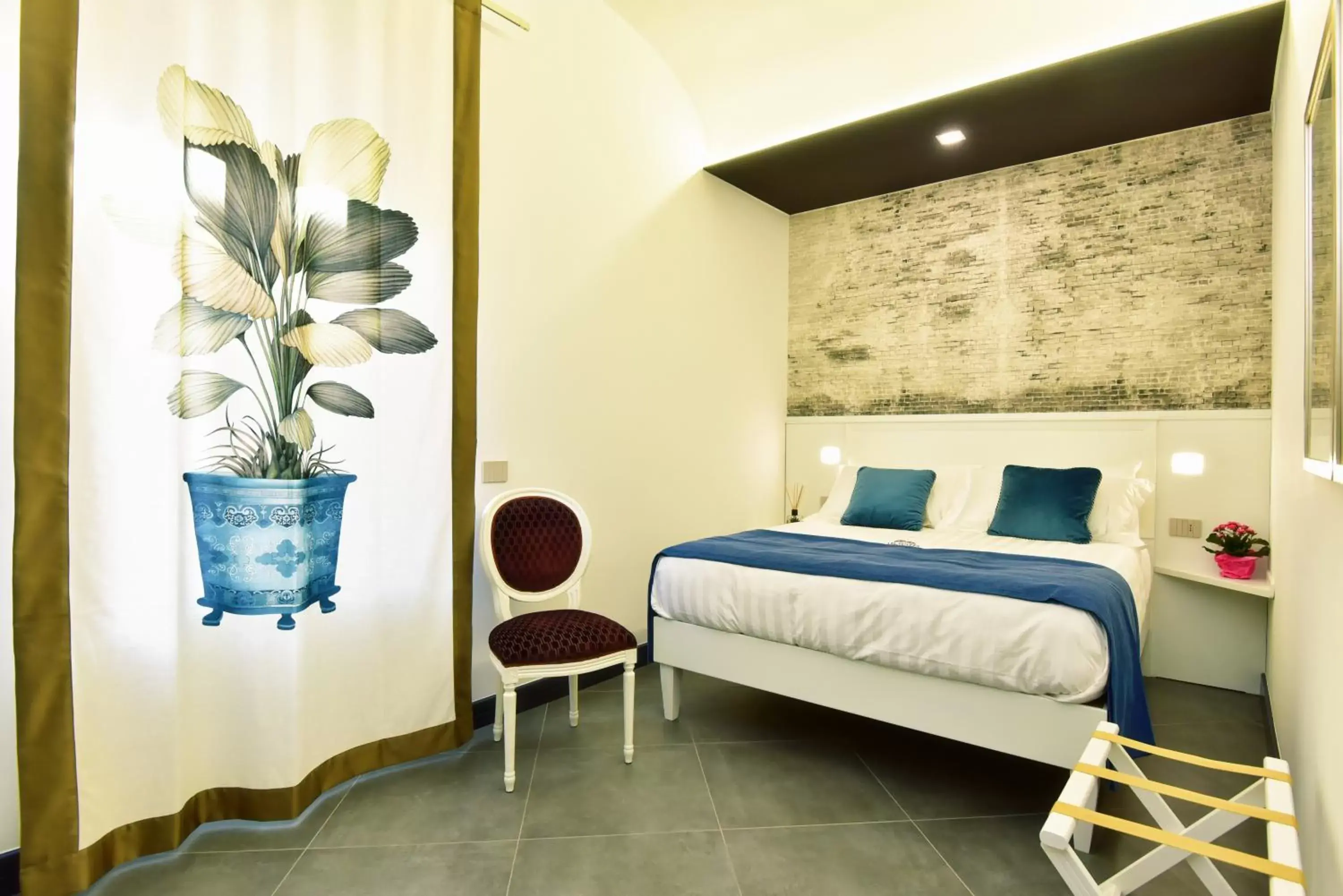 Bed in ANFITEATRO LE SUITES