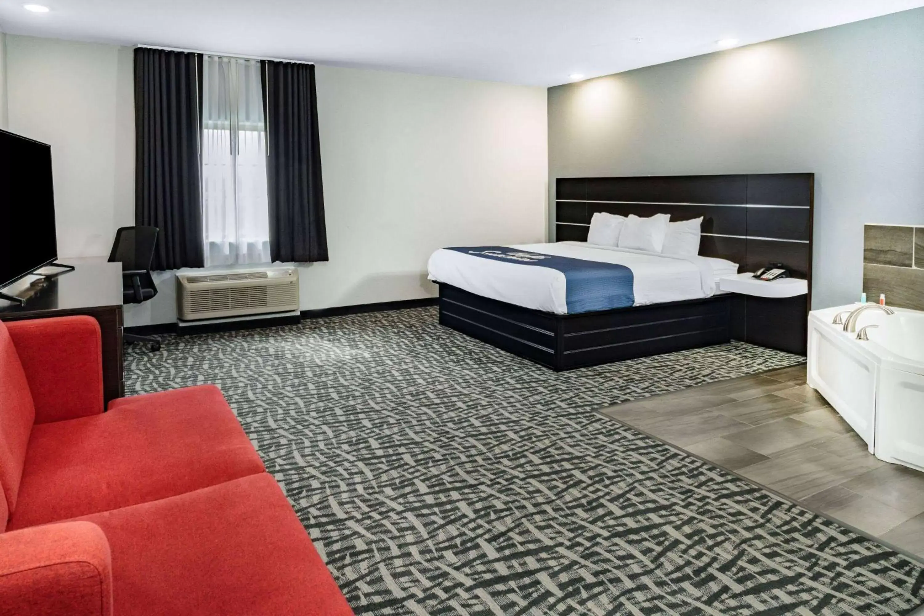 Photo of the whole room, Bed in Days Inn & Suites by Wyndham Horn Lake - Memphis Graceland