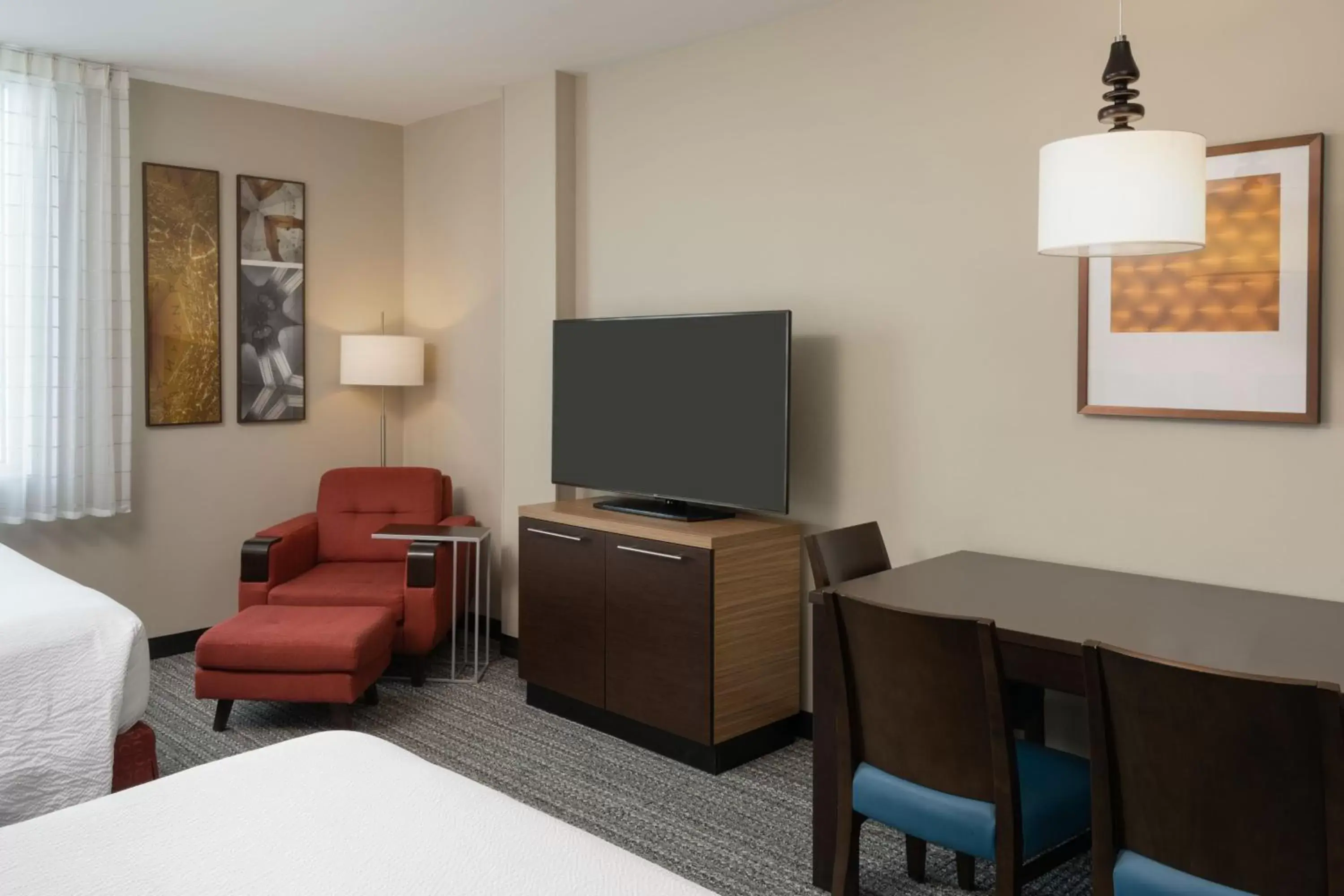 Photo of the whole room, TV/Entertainment Center in TownePlace Suites Miami Kendall West