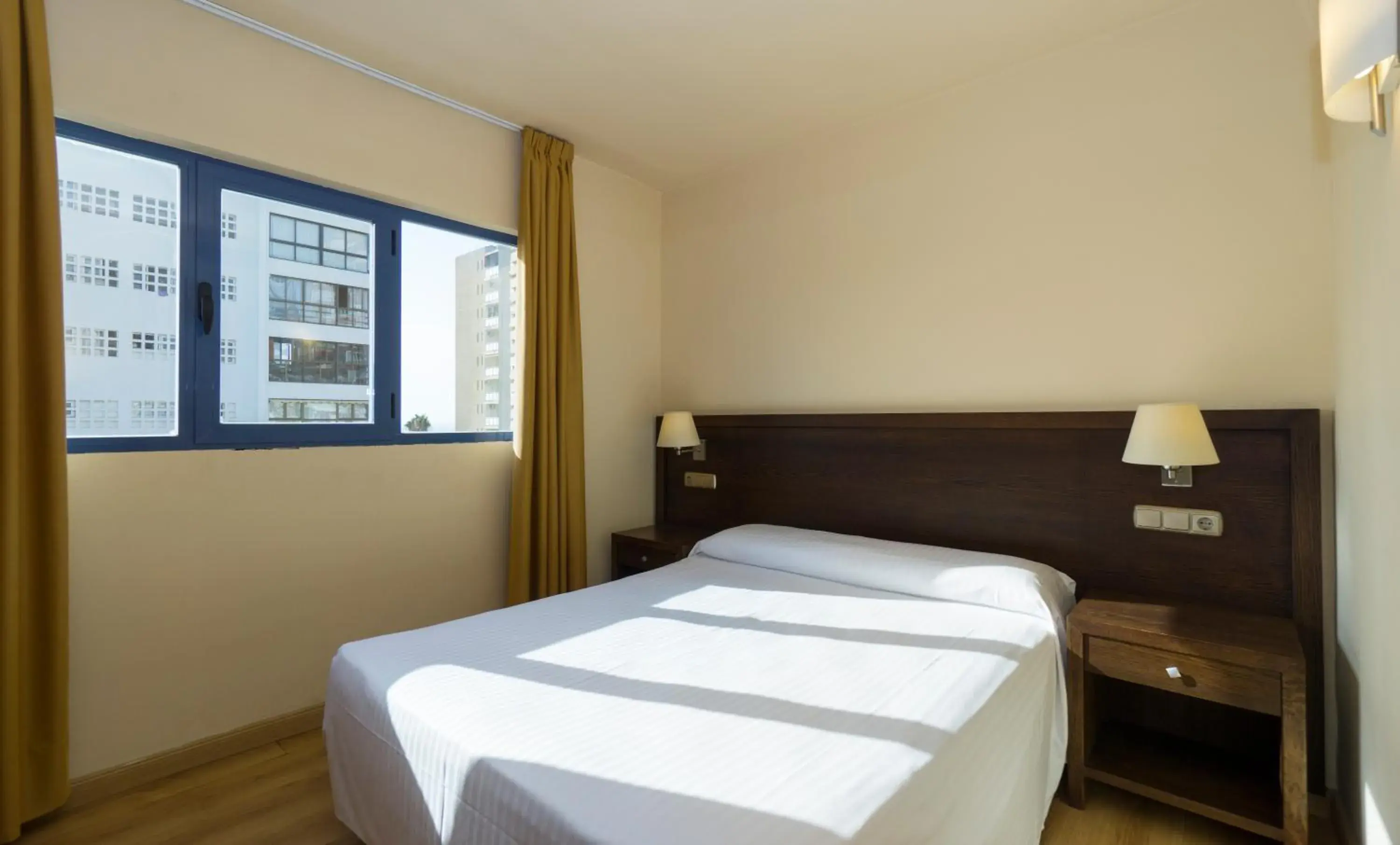 Bed in Apartamentos MS Pepita Bed in Apartamentos MS Pepita