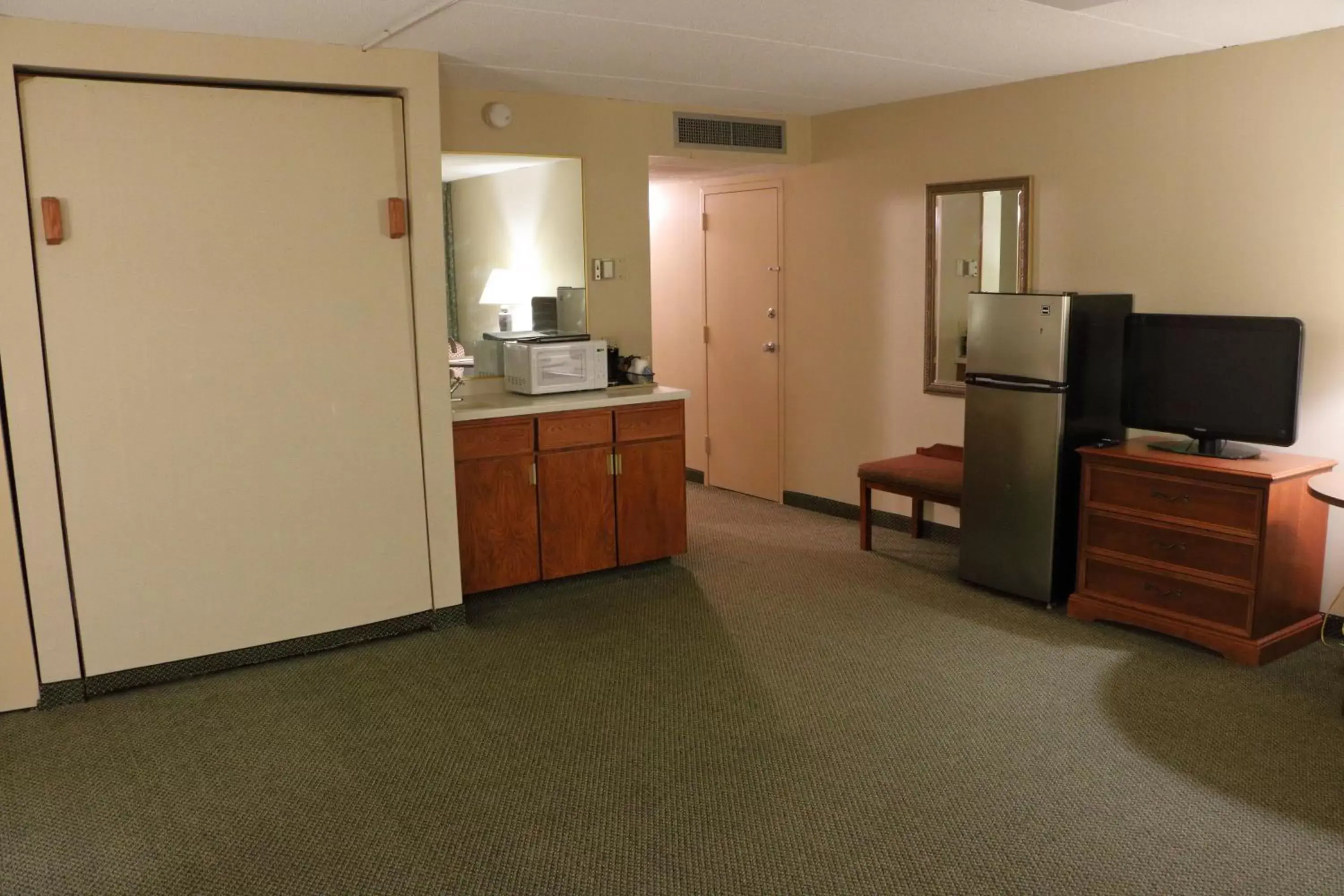 Photo of the whole room, TV/Entertainment Center in Ramada by Wyndham Alpena