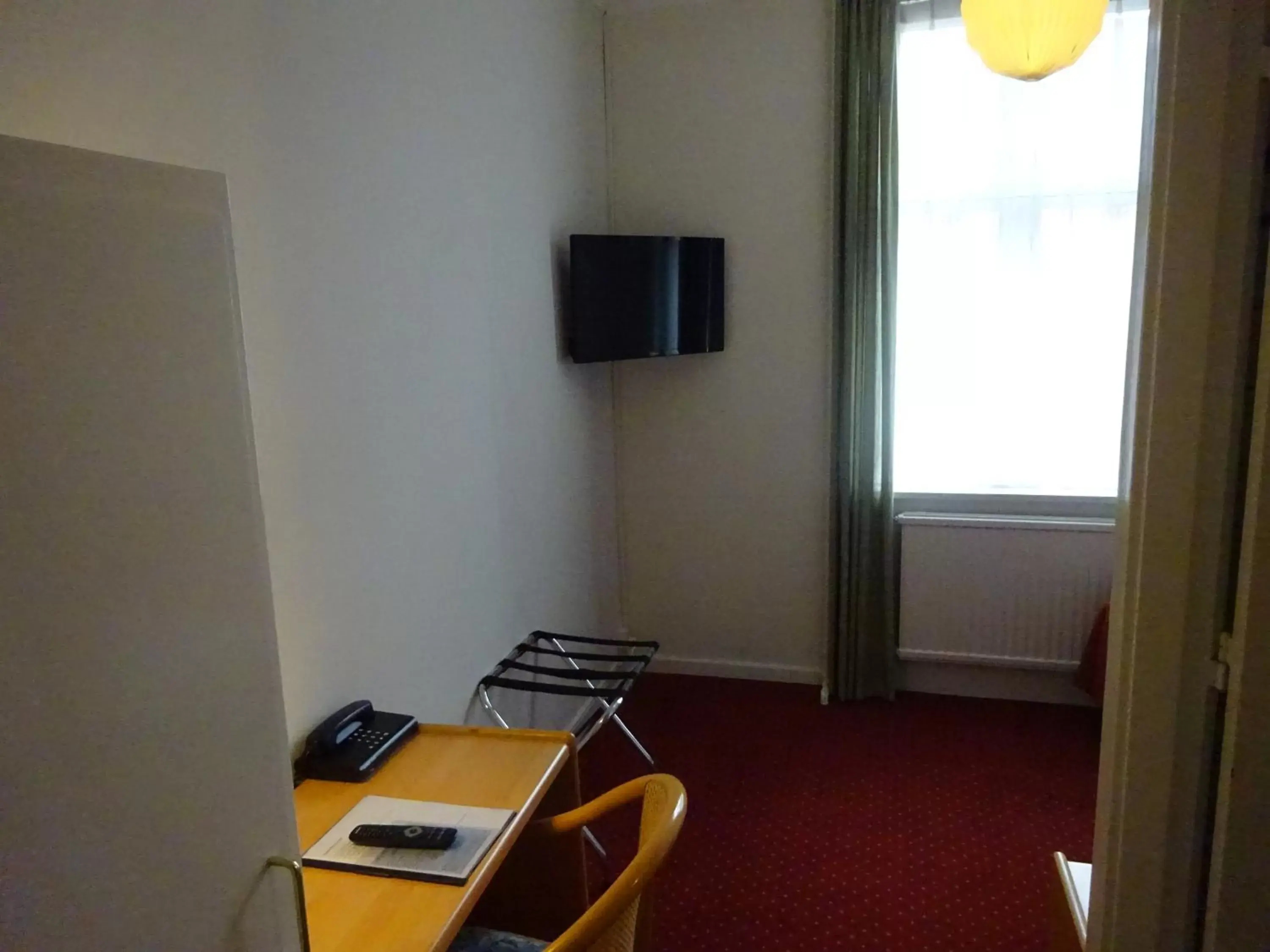 Photo of the whole room, TV/Entertainment Center in City Hotel Nebo