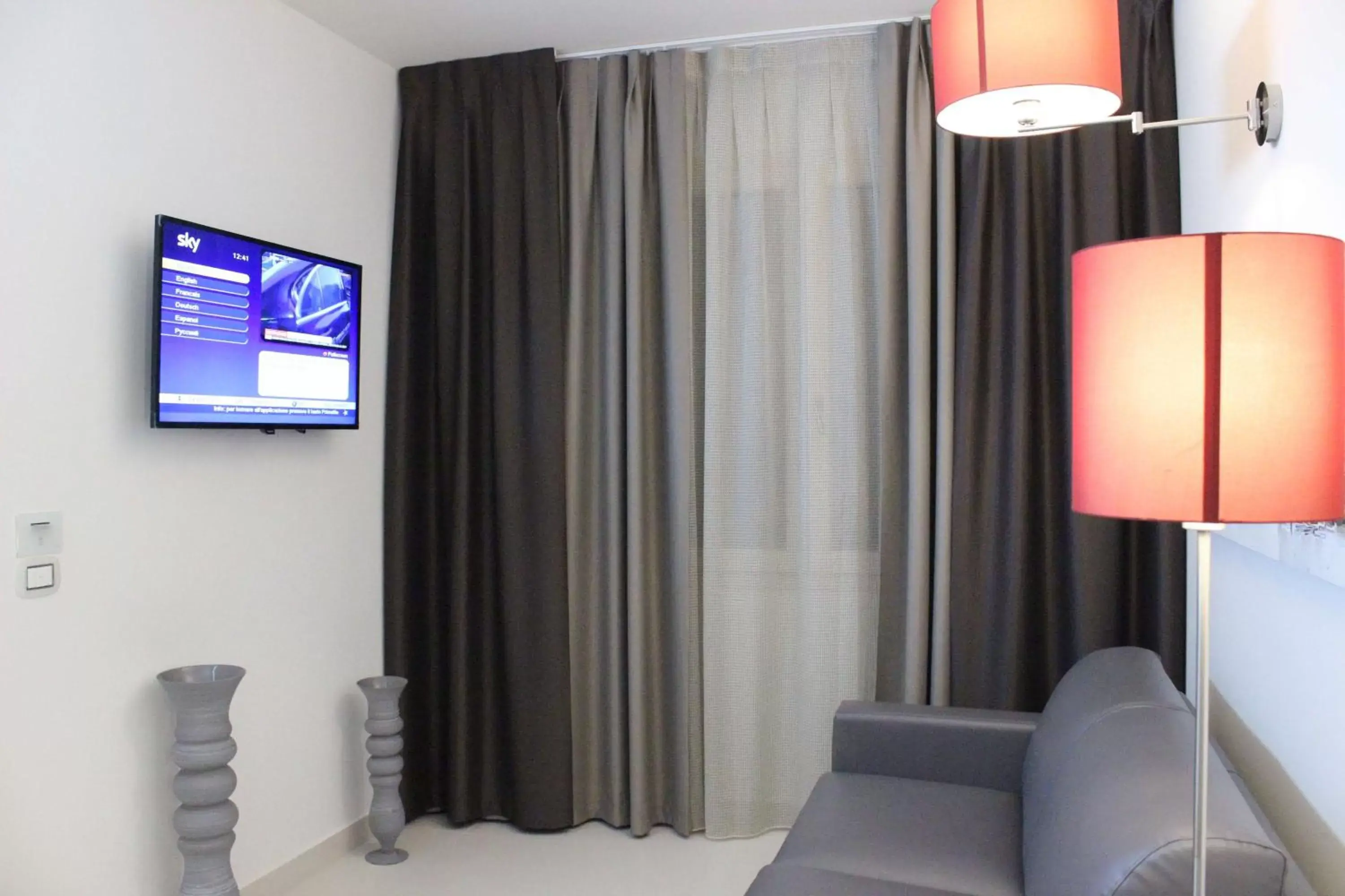 Living room, TV/Entertainment Center in Best Western Plus Hotel Perla Del Porto