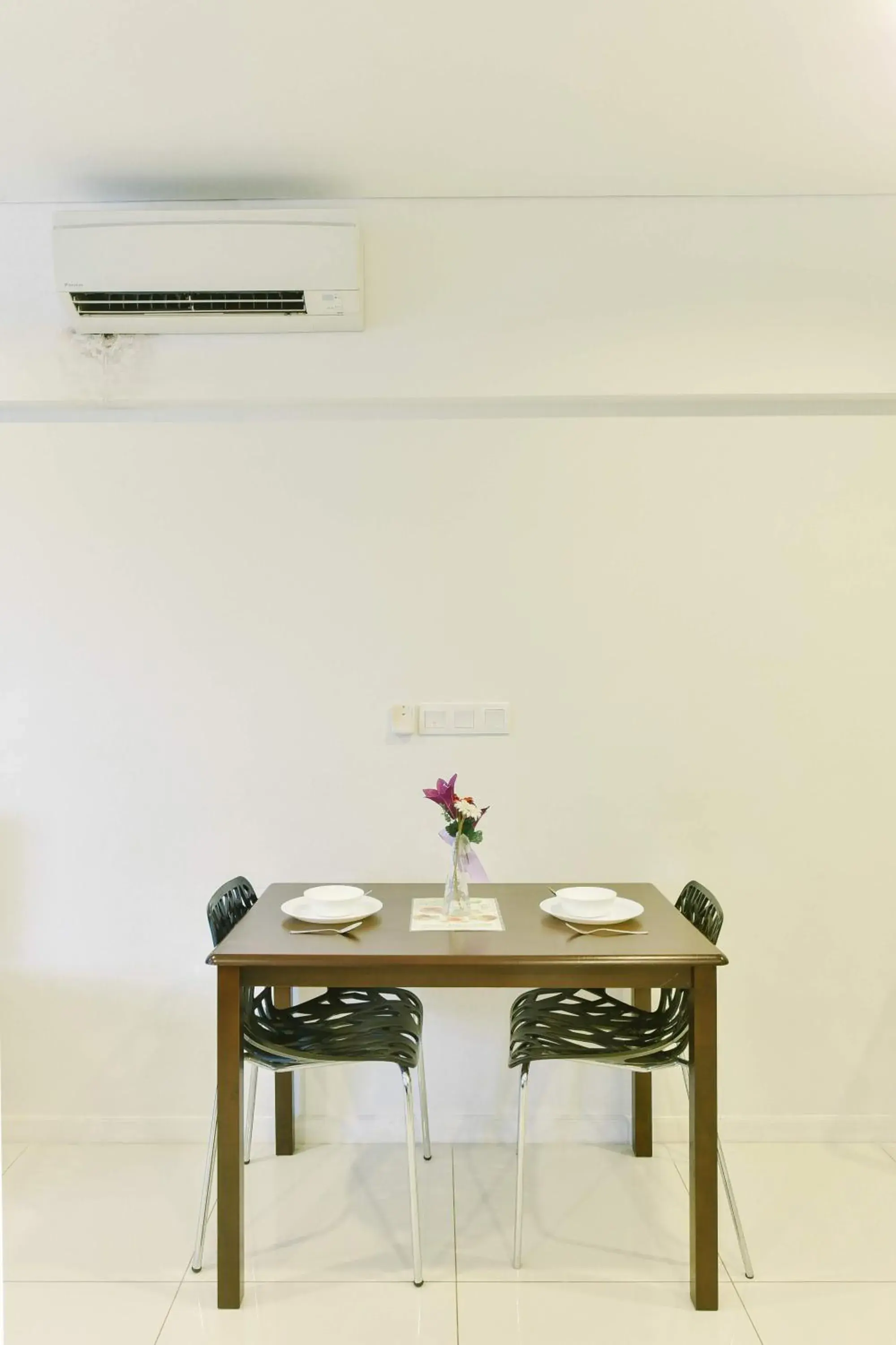 Dining Area in Summer Suites Residences by Subhome