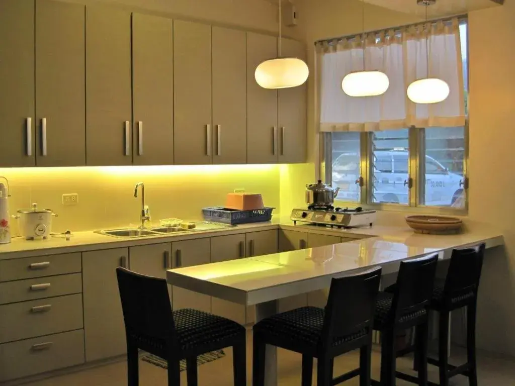 Kitchen/Kitchenette in Agreeable Family Baguio Suites