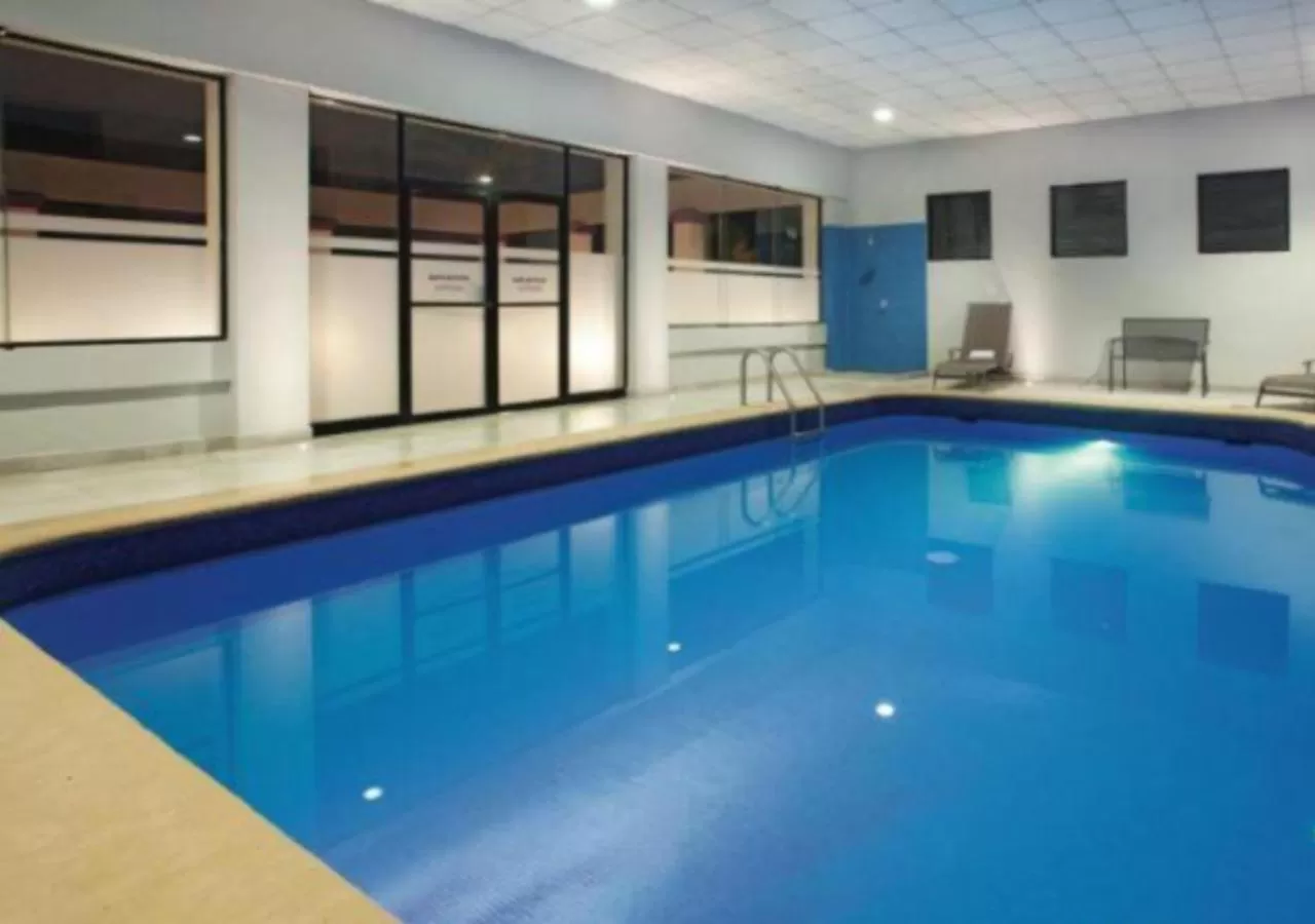 Swimming pool in CHN Hotel Monterrey Centro, Trademark Collection by Wyndham