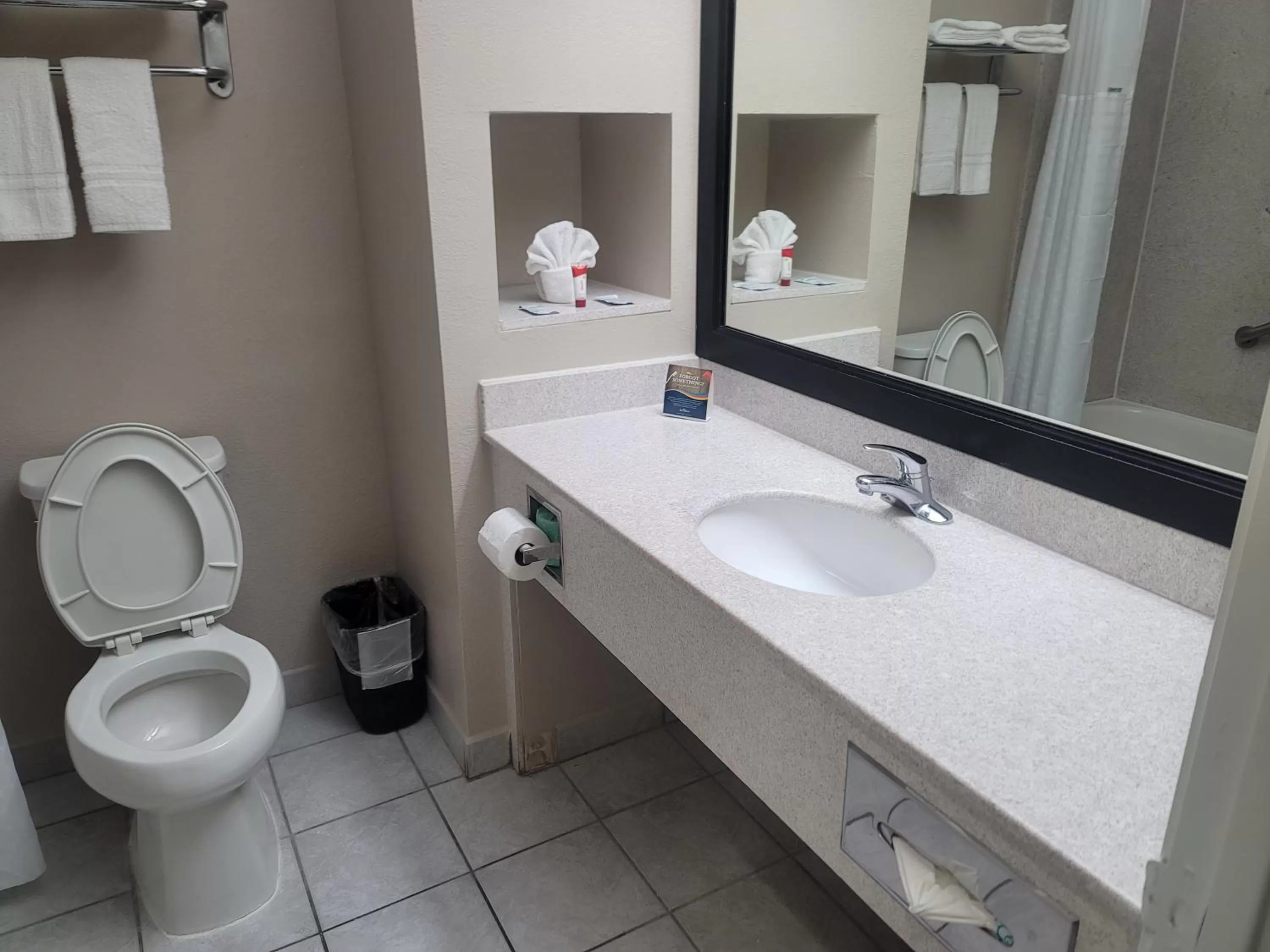 Bathroom in Baymont by Wyndham Houston Brookhollow