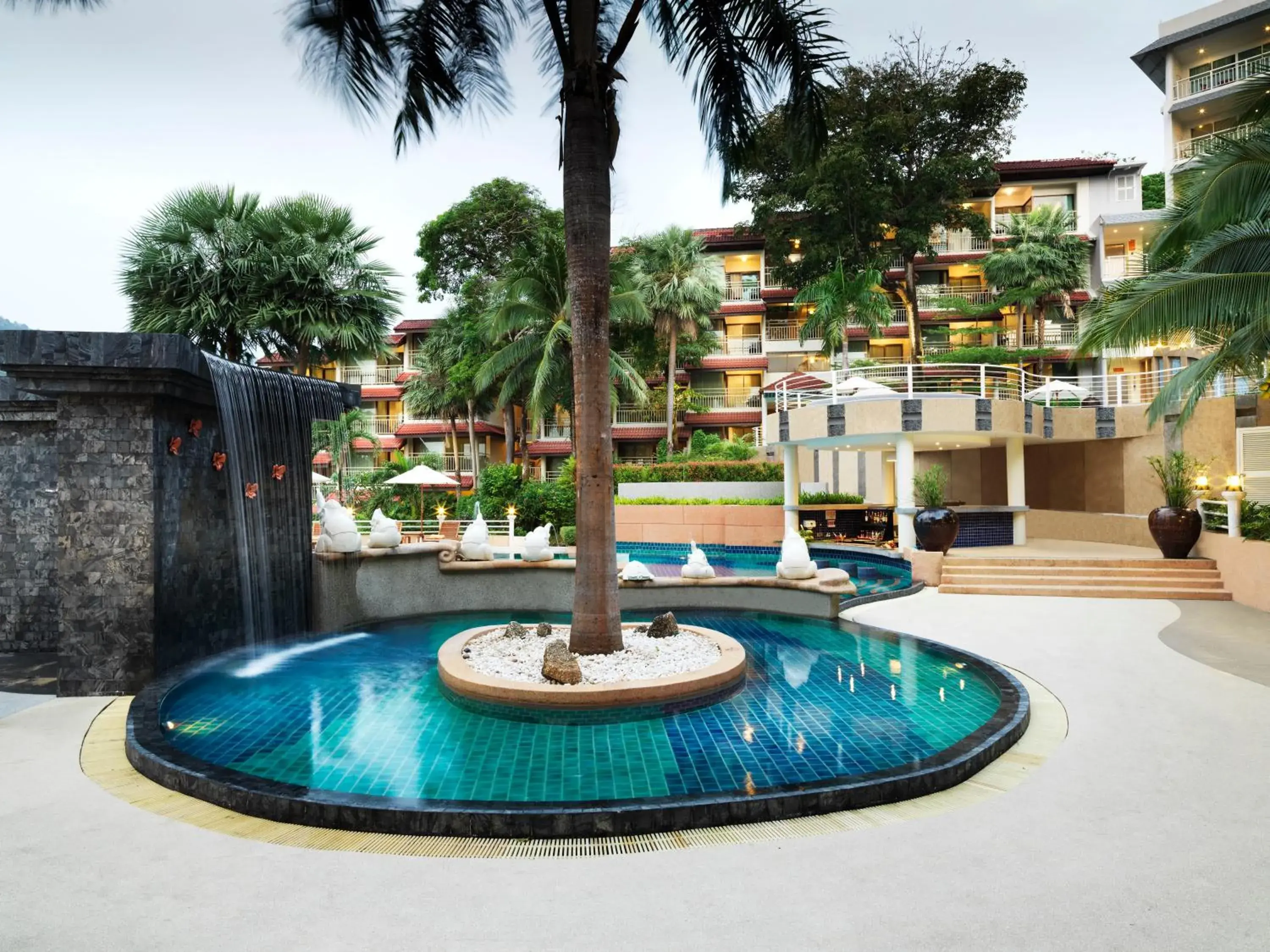 Swimming pool in Chanalai Flora Resort, Kata Beach Swimming pool in Chanalai Flora Resort, Kata Beach