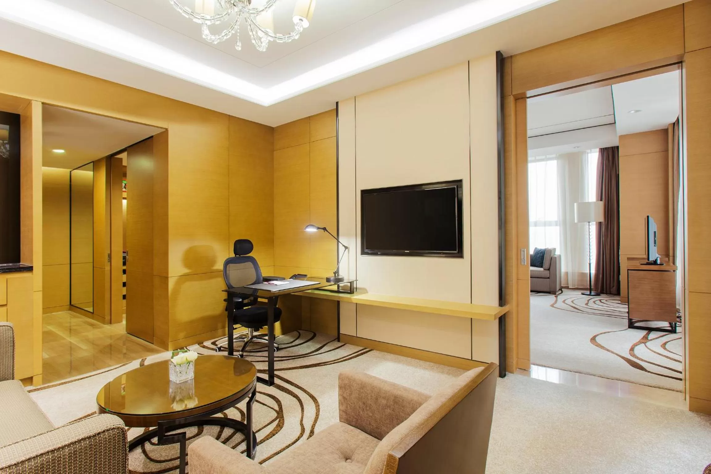 Living room in Crowne Plaza Tianjin Meijiangnan by IHG