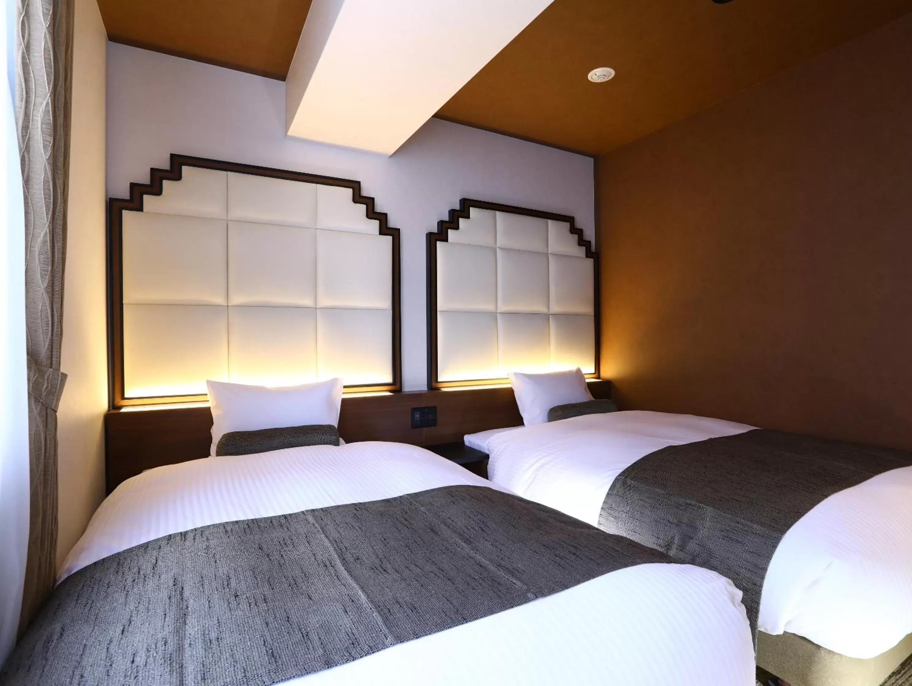 Bed in Hotel Wing International Select Osaka Umeda