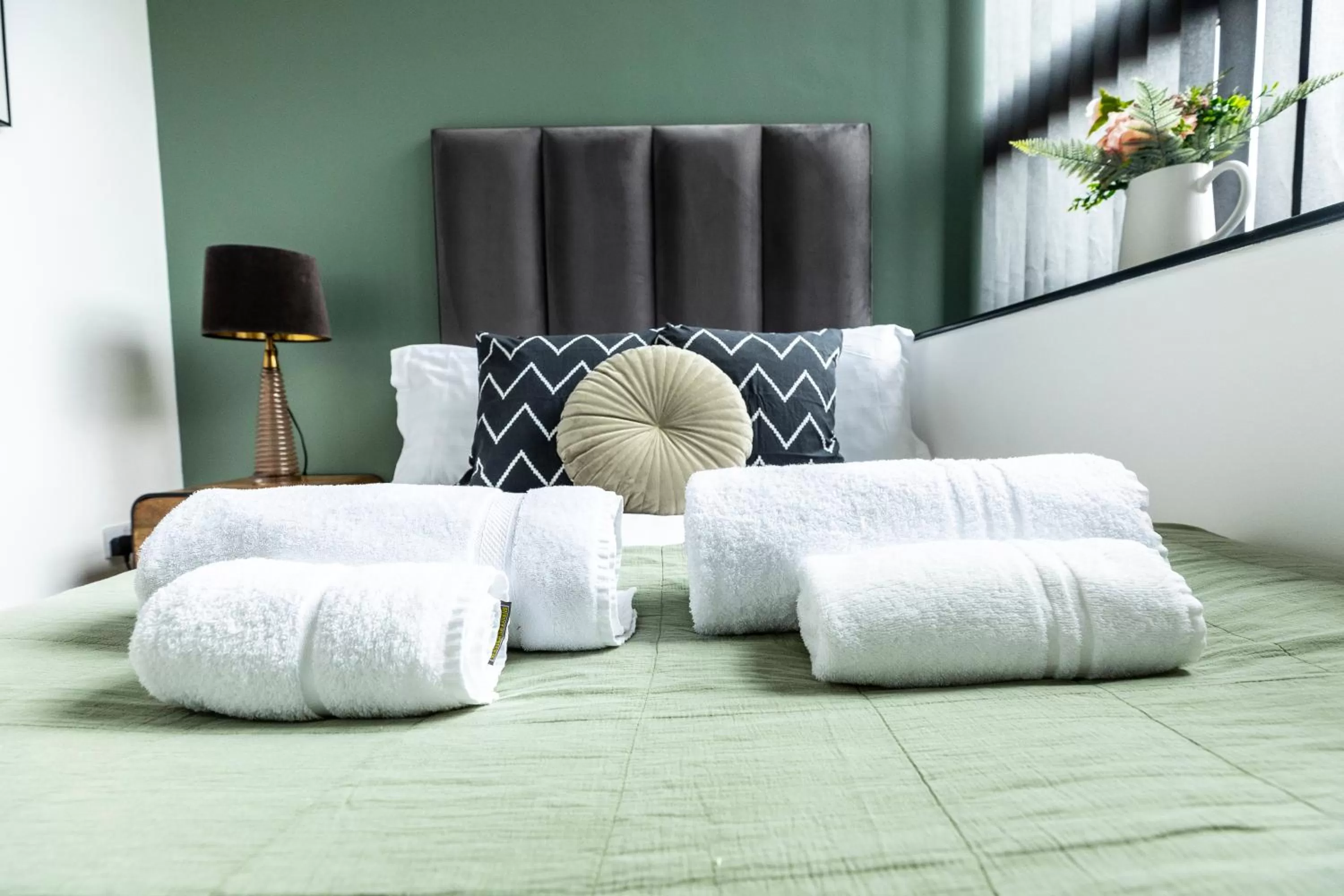 Bed in Spire Accommodations Ltd