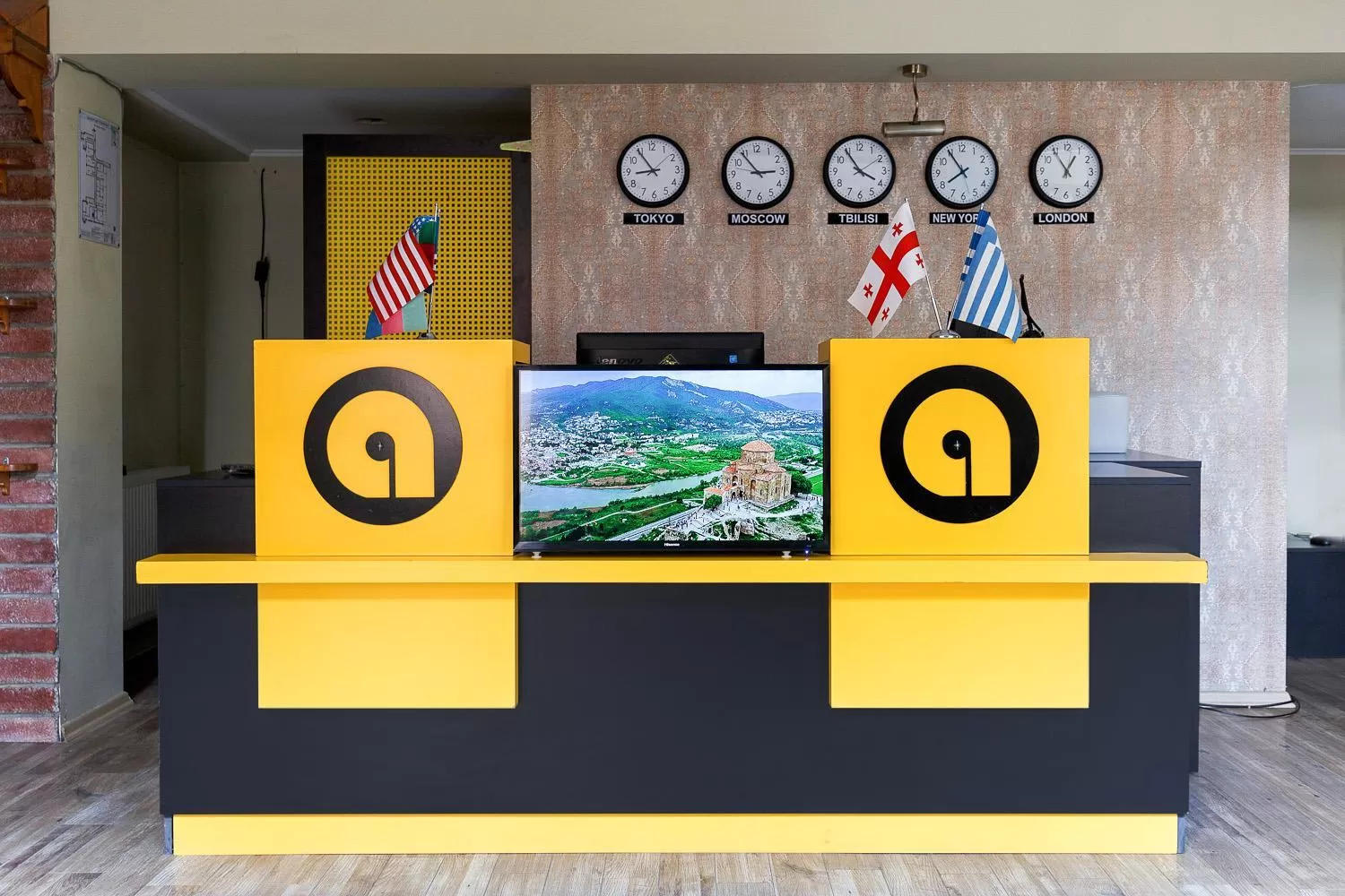 Communal lounge/ TV room in Aura Plaza Hotel