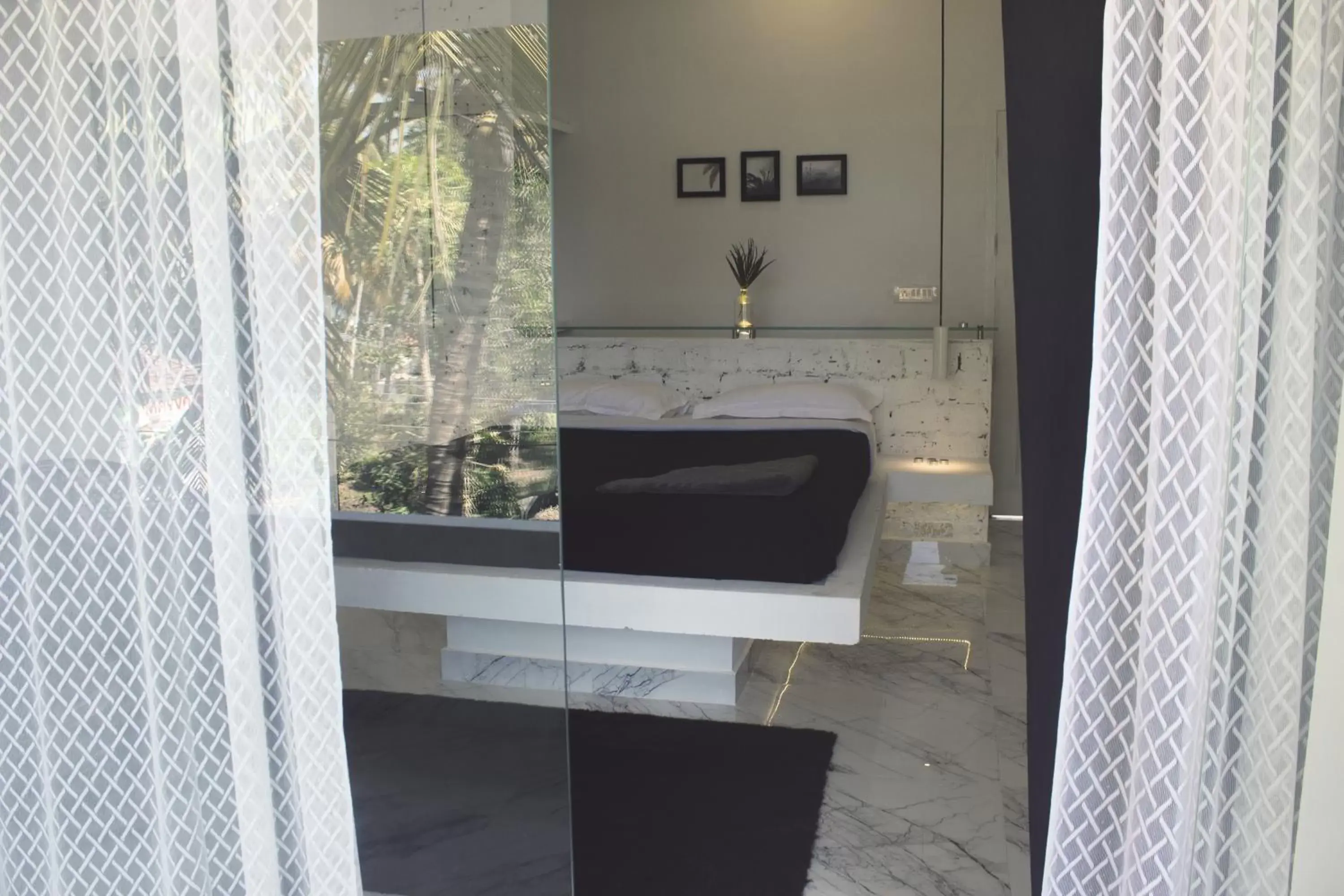 Bed, TV/Entertainment Center in Satta Beach Residence Bed, TV/Entertainment Center in Satta Beach Residence