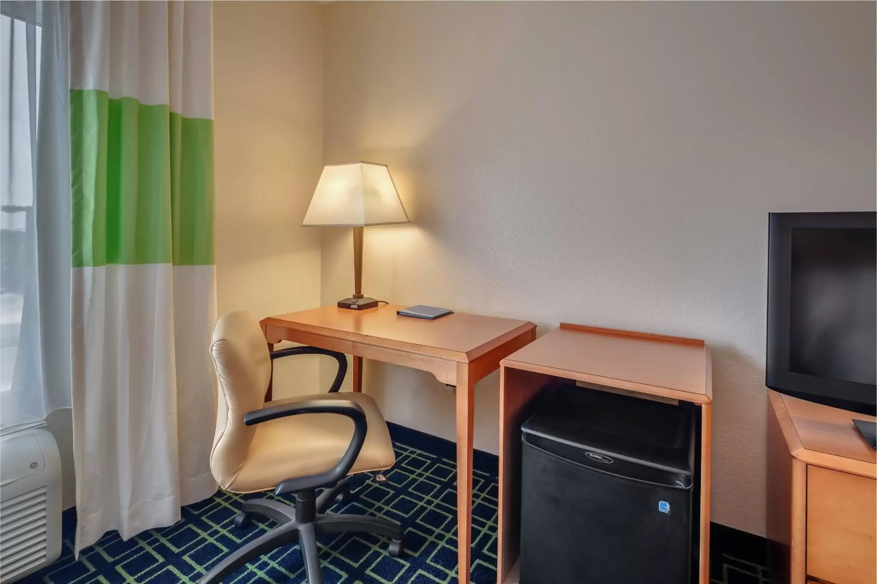 Photo of the whole room, TV/Entertainment Center in Fairfield Inn and Suites Jacksonville Beach