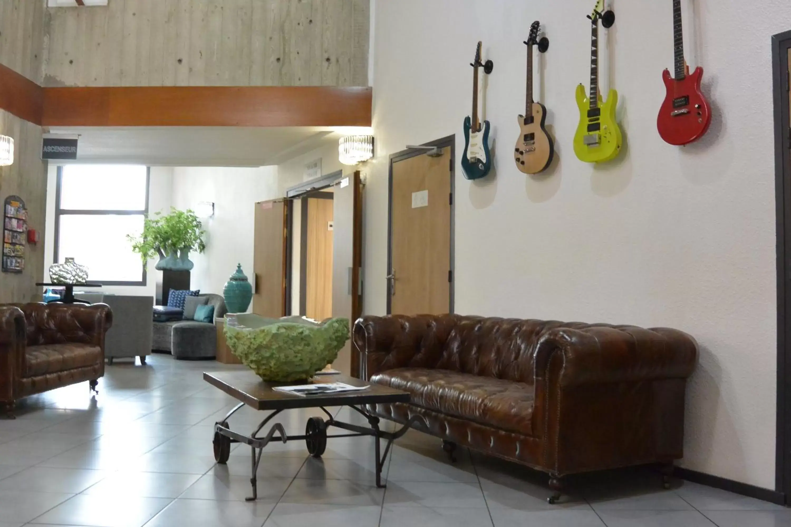 Communal lounge/ TV room, Lobby/Reception in KYRIAD LYON EST - Genas Eurexpo