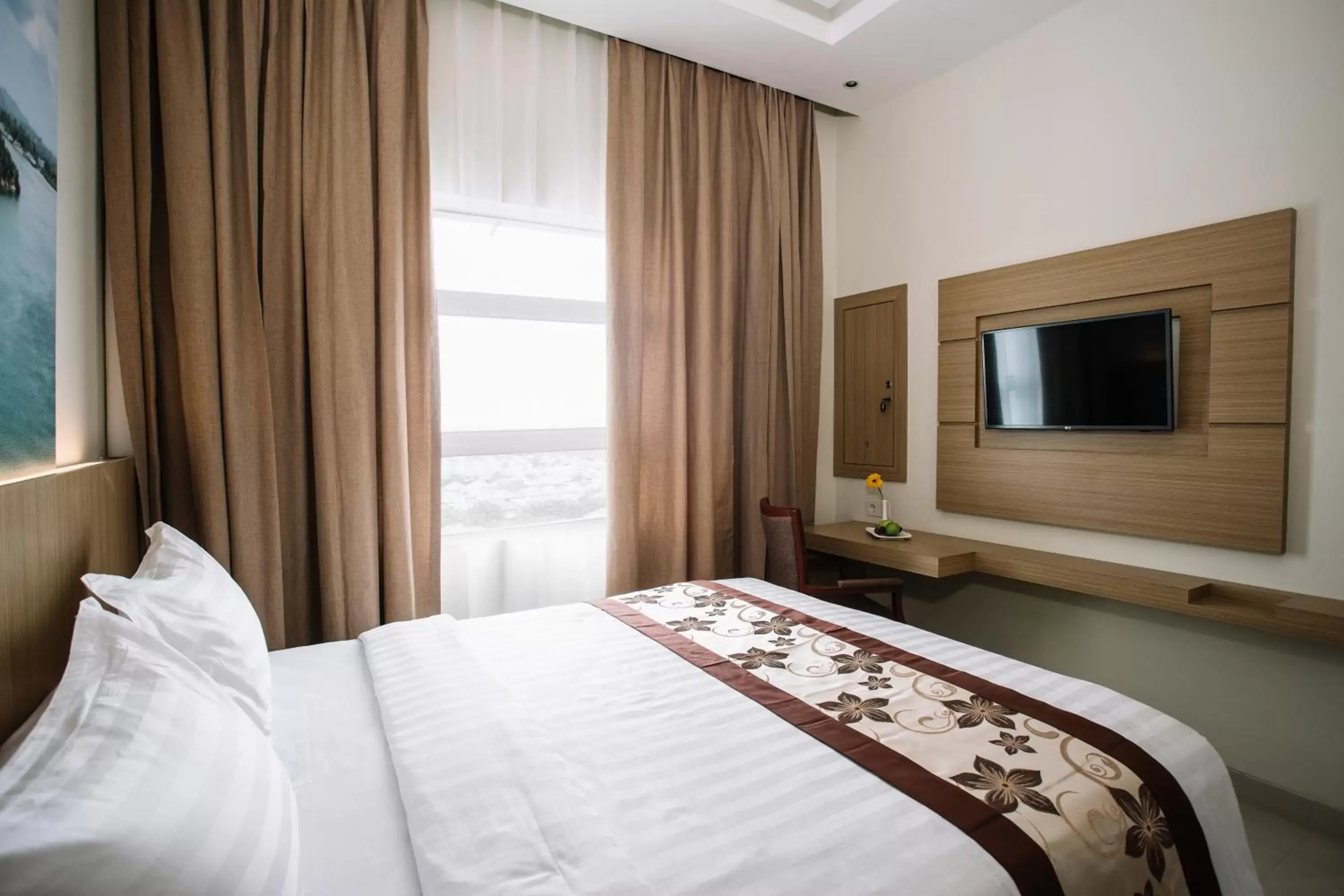 Bedroom in Sahid Batam Center Hotel and Convention Bedroom in Sahid Batam Center Hotel and Convention
