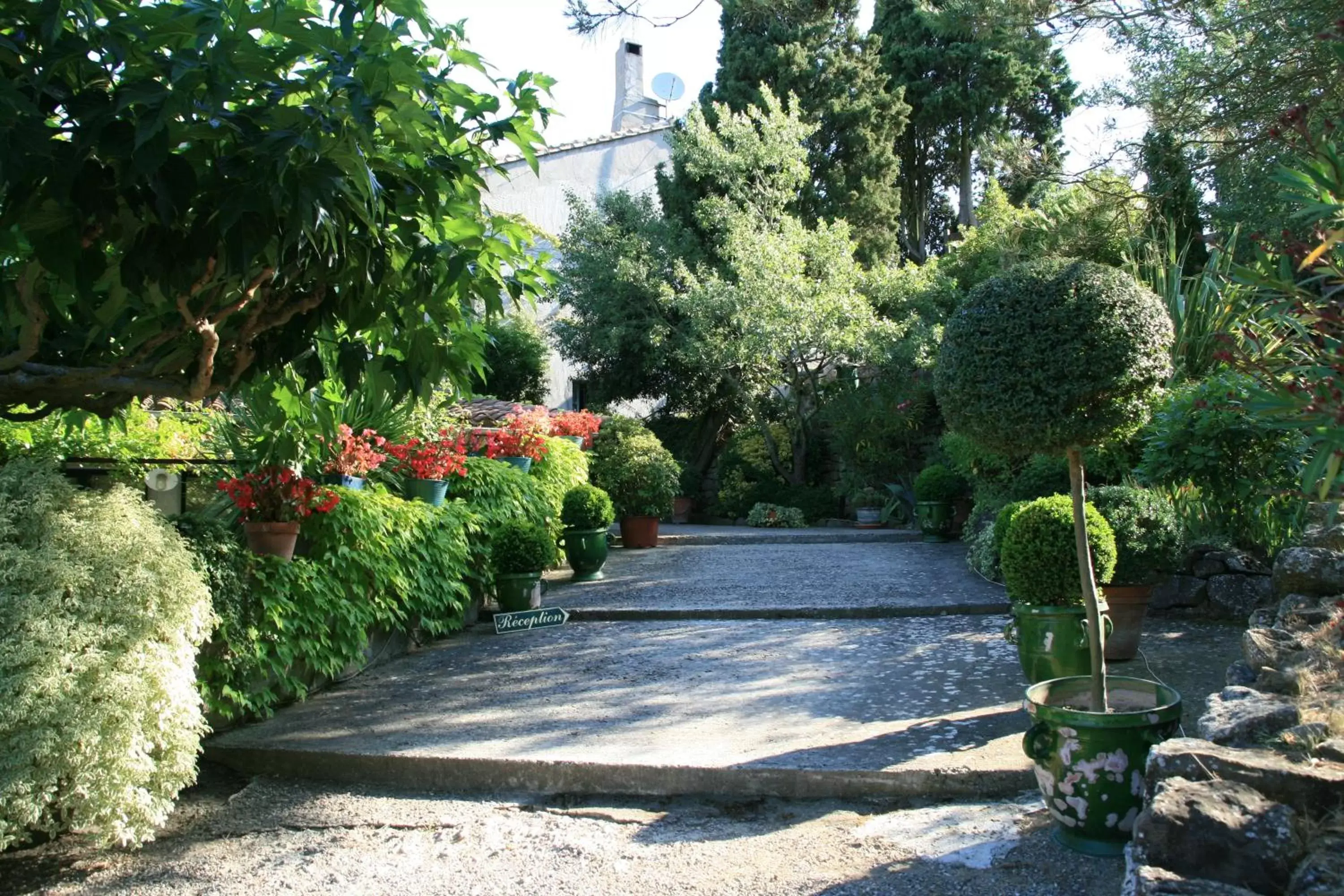 Facade/entrance, Garden in La Maison sur la Colline