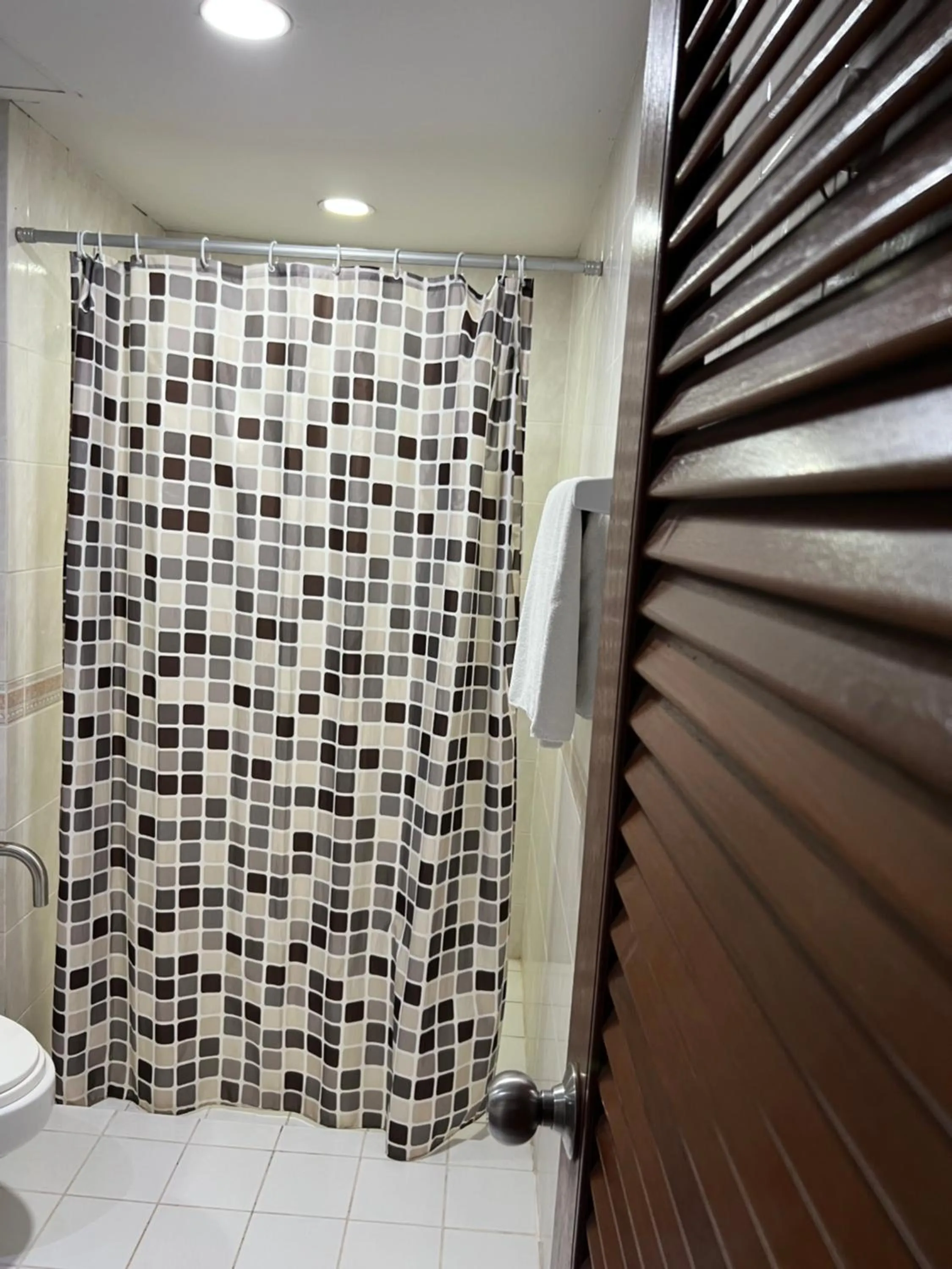 Shower in Mall Suites Hotel