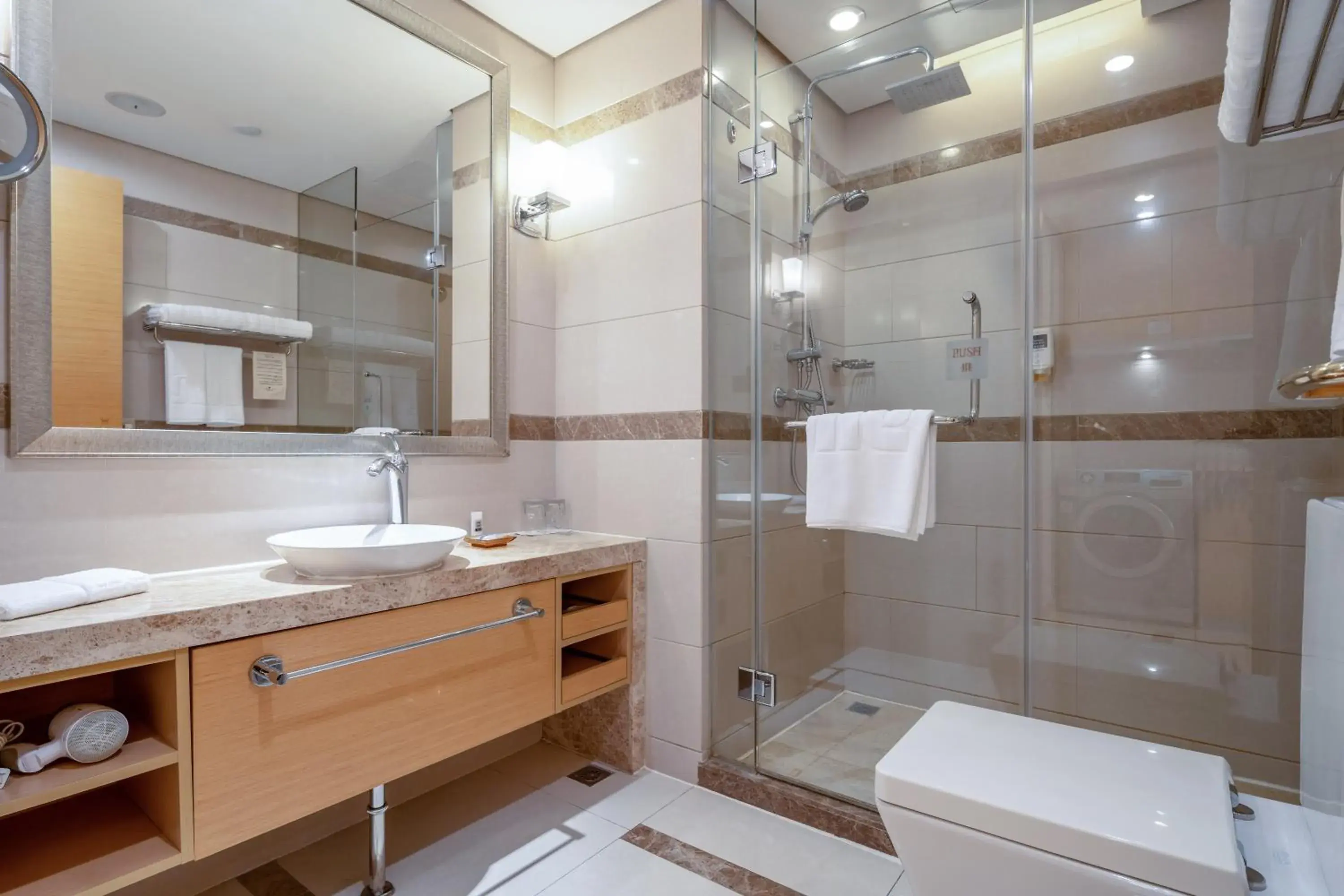 Bathroom in Regal Plaza Hotel & Residence