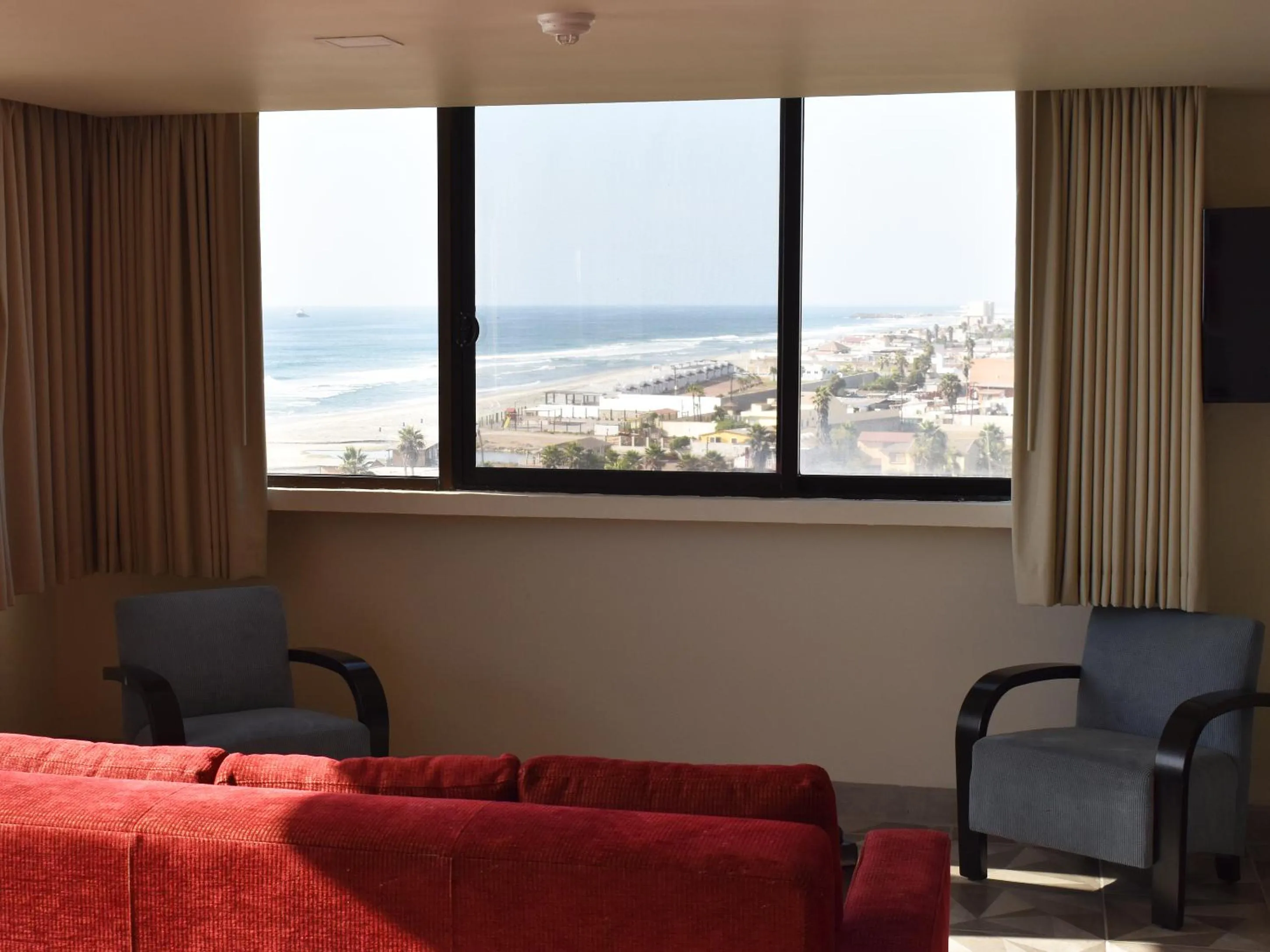 Seating area in Hotel Corona Plaza