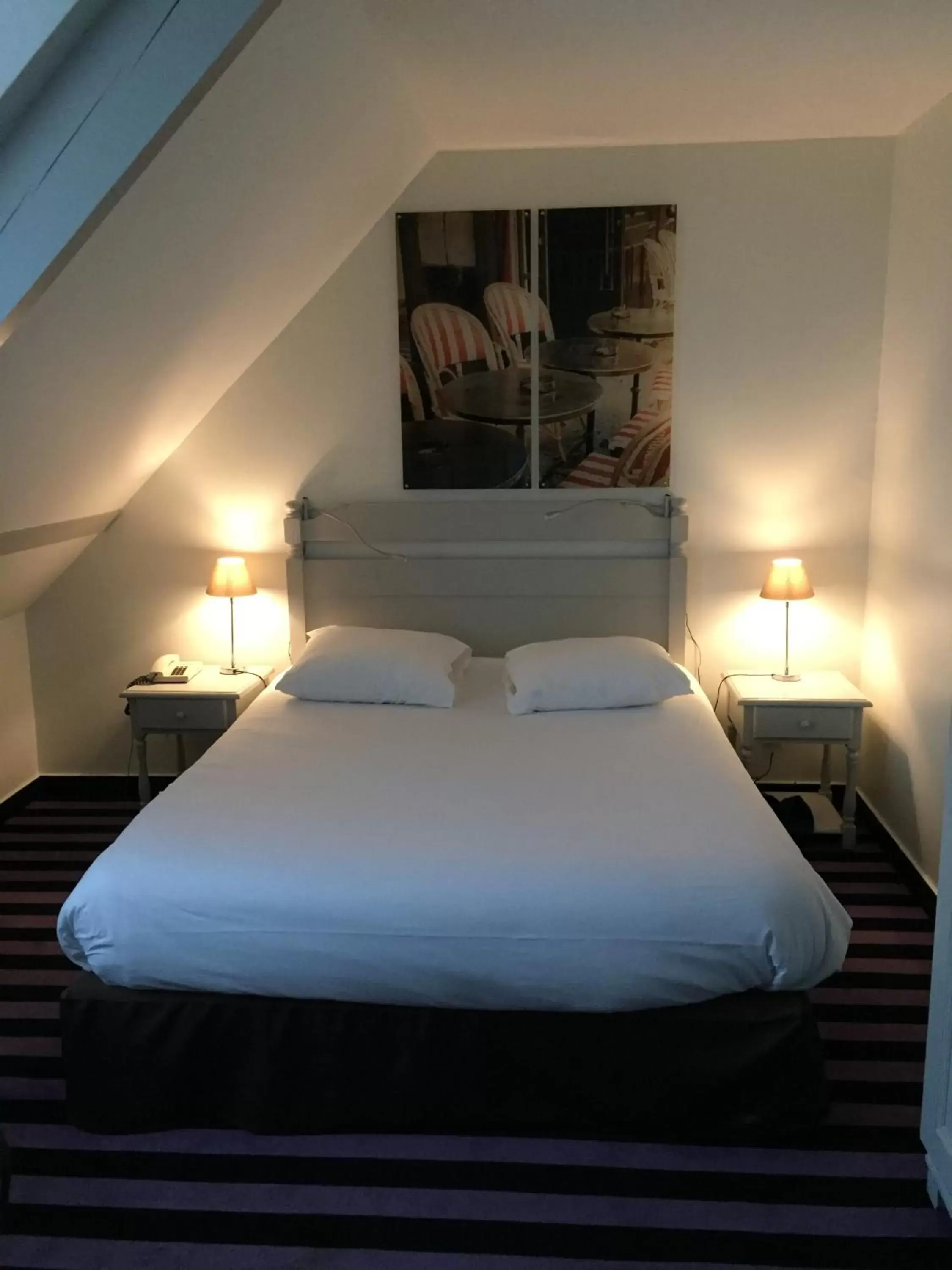 Photo of the whole room, Bed in Hotel Le Cardinal Rueil Centre