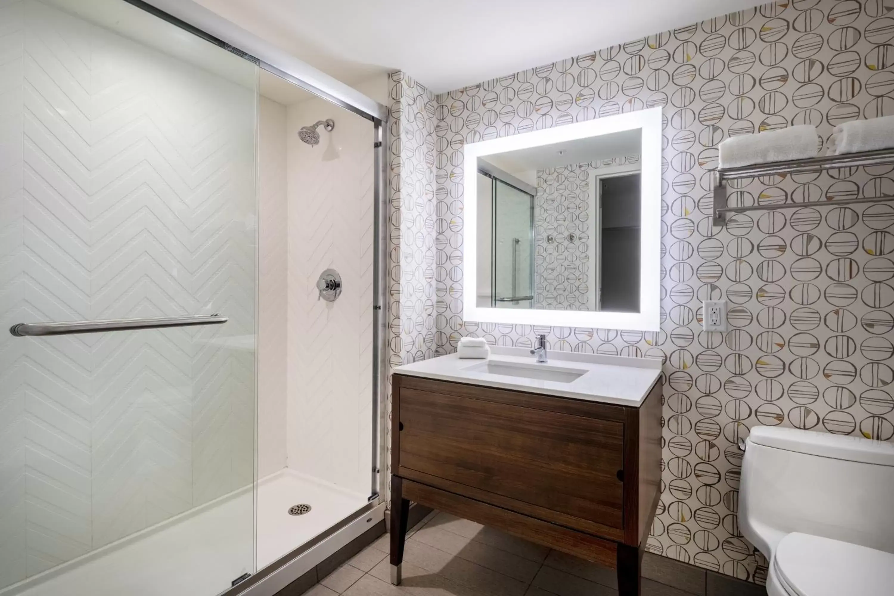 Bathroom in Holiday Inn - Long Island - ISLIP Arpt East, an IHG Hotel