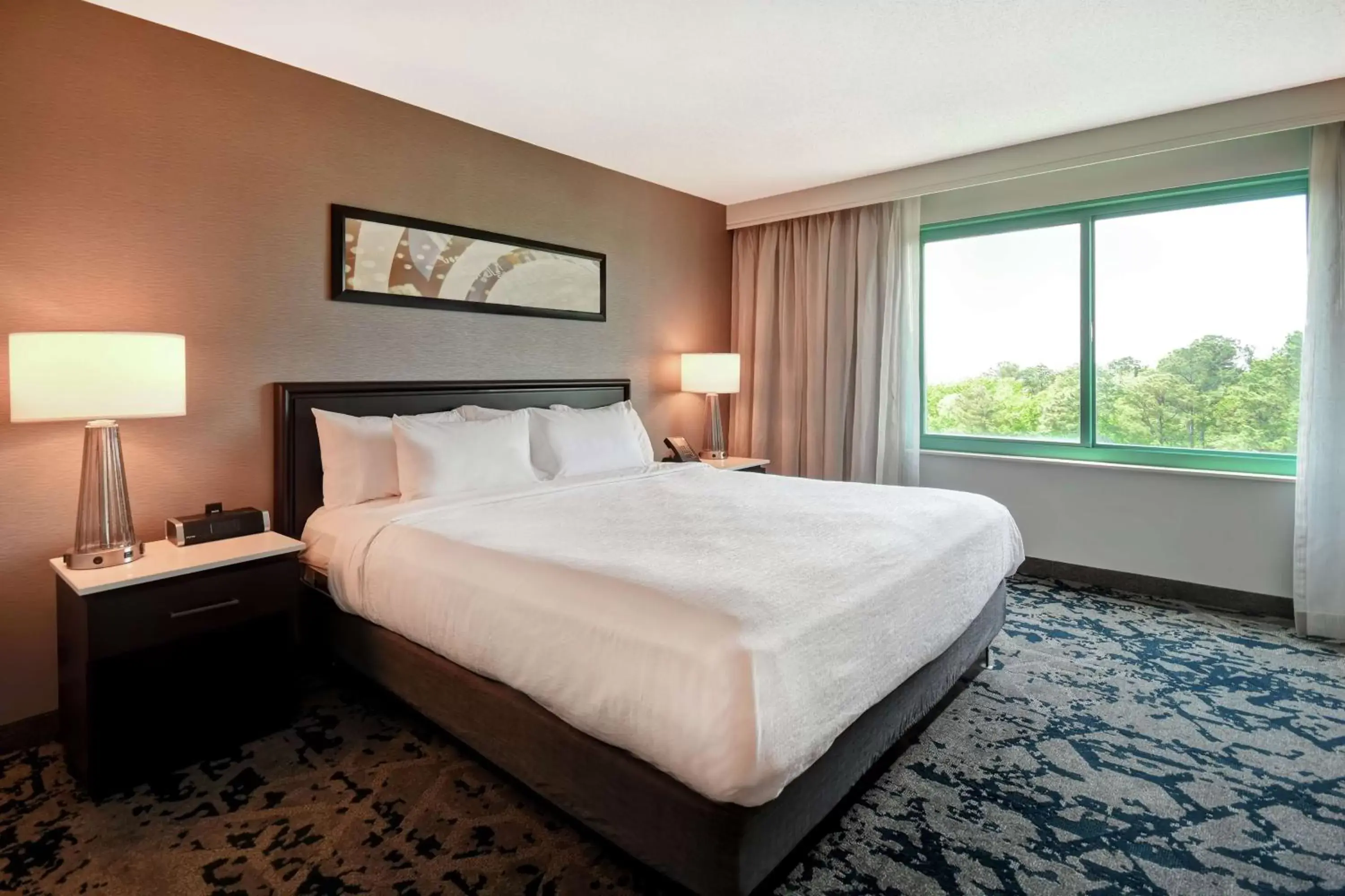 Bed in Embassy Suites by Hilton Raleigh Durham Research Triangle