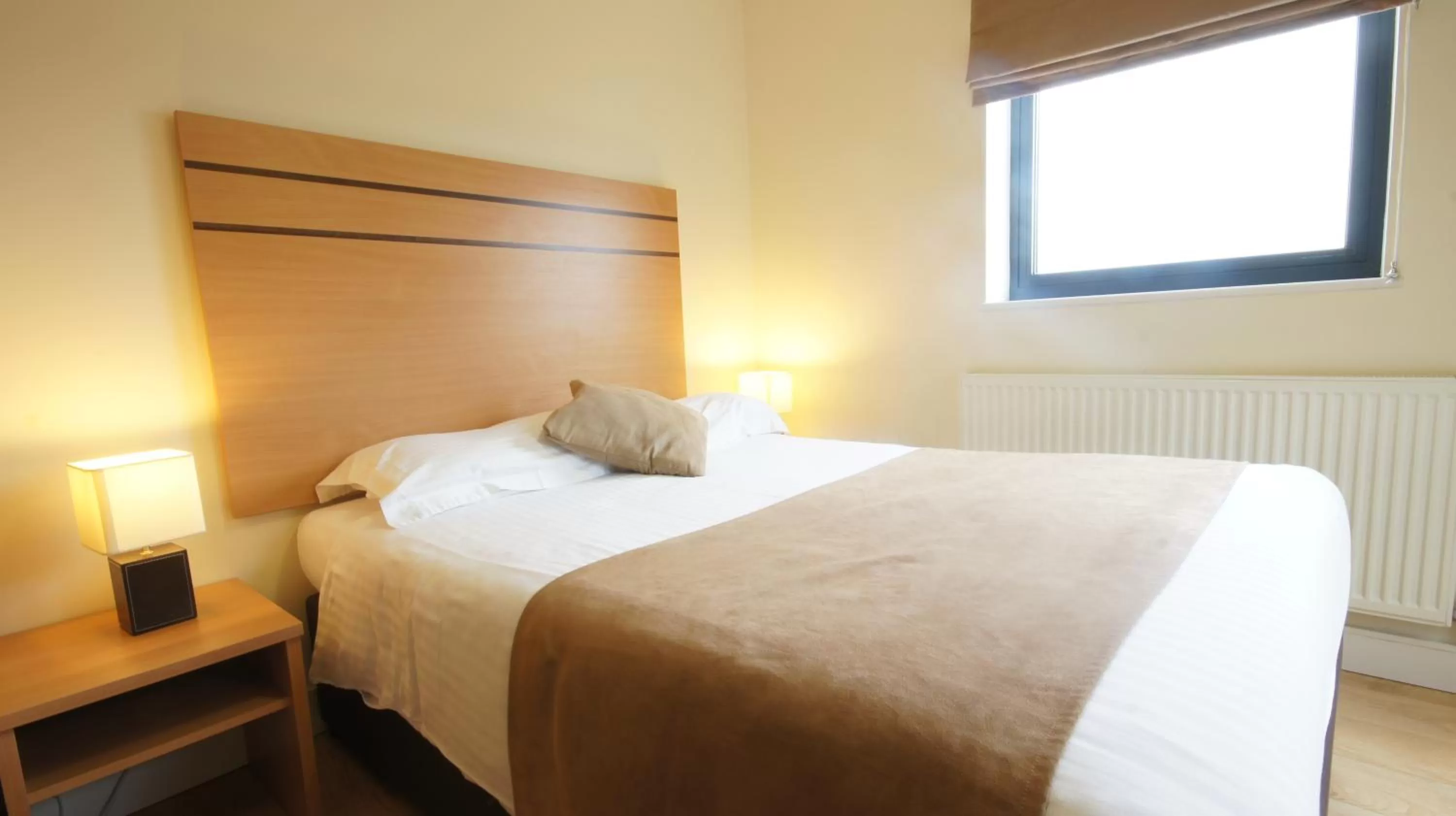 Bedroom, Bed in Lodge Drive Serviced Apartments