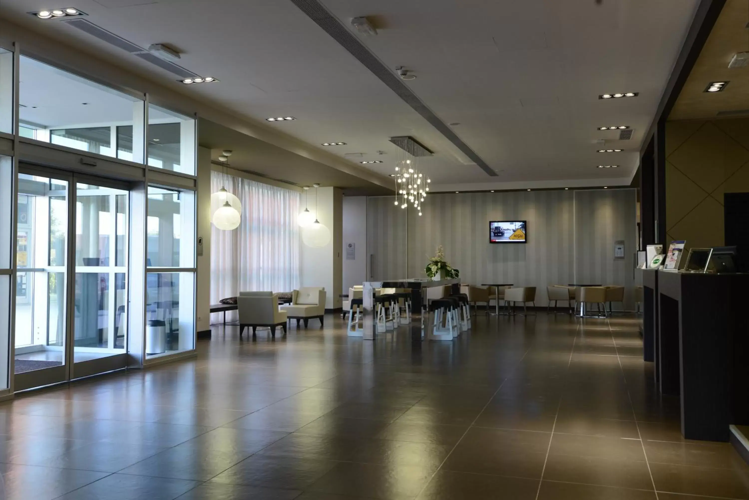 Lobby or reception in Best Western Premier CHC Airport
