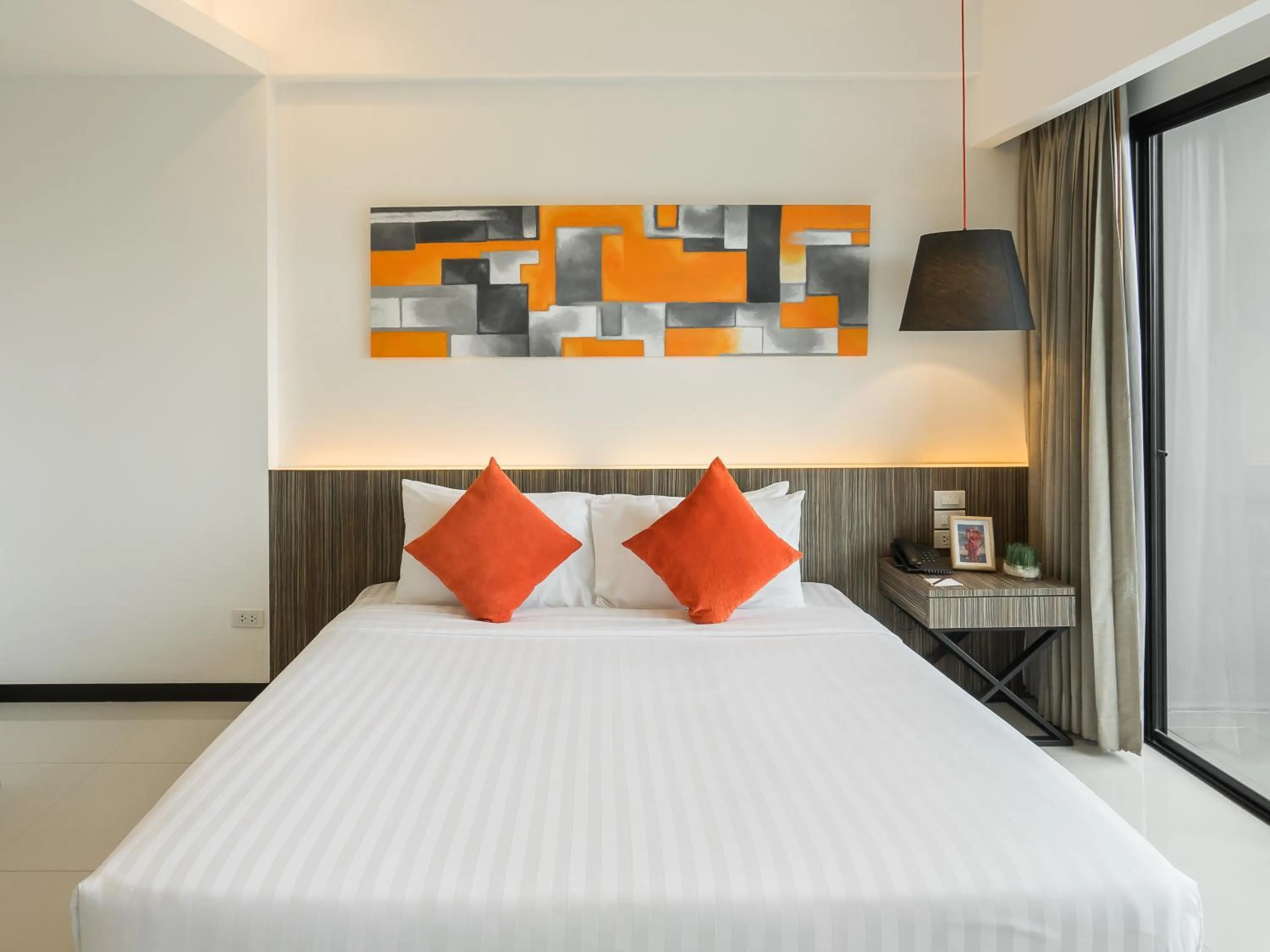 Bed in Hotel J Residence Pattaya