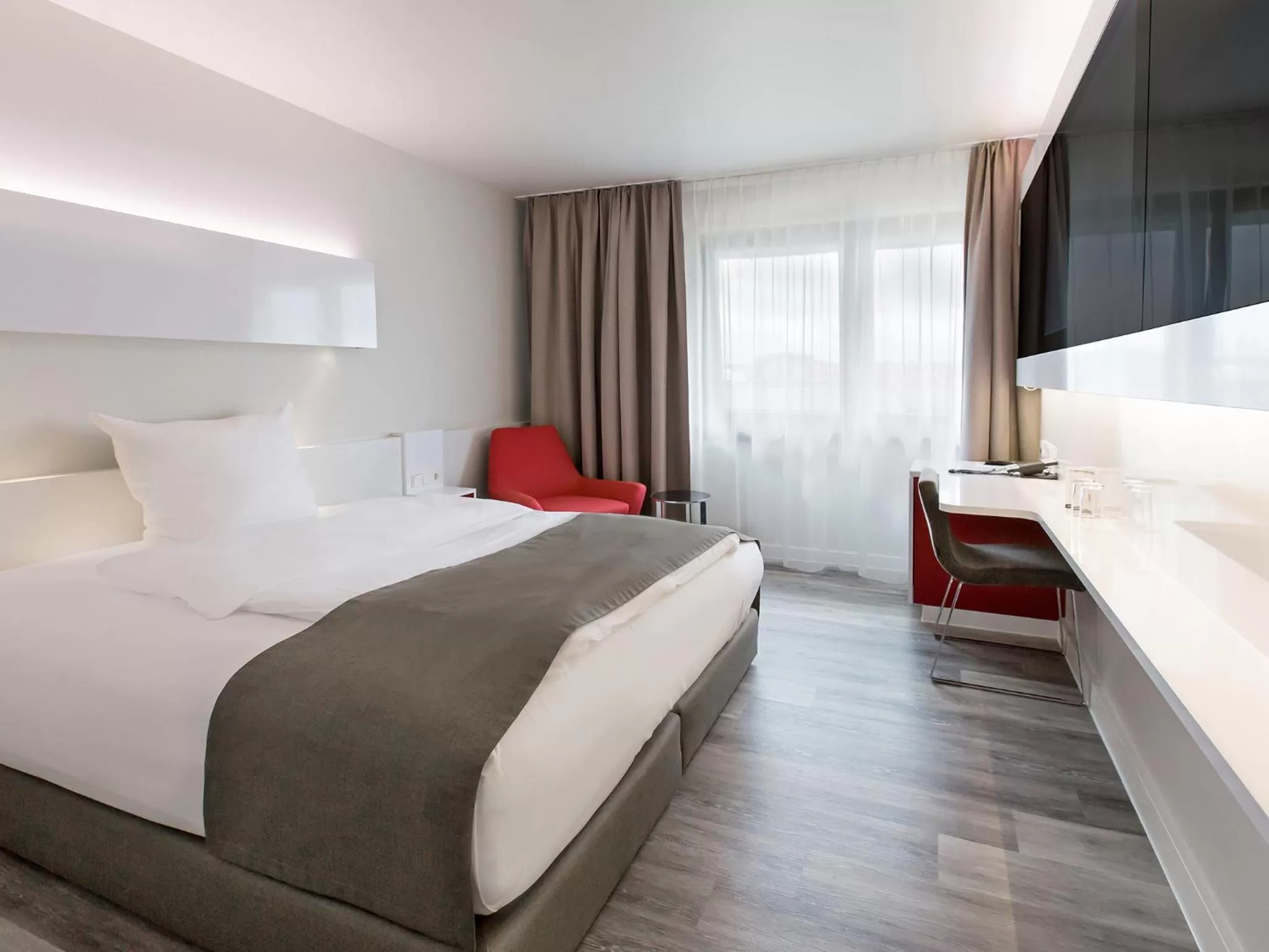 Photo of the whole room, Bed in DORMERO Hotel Hannover