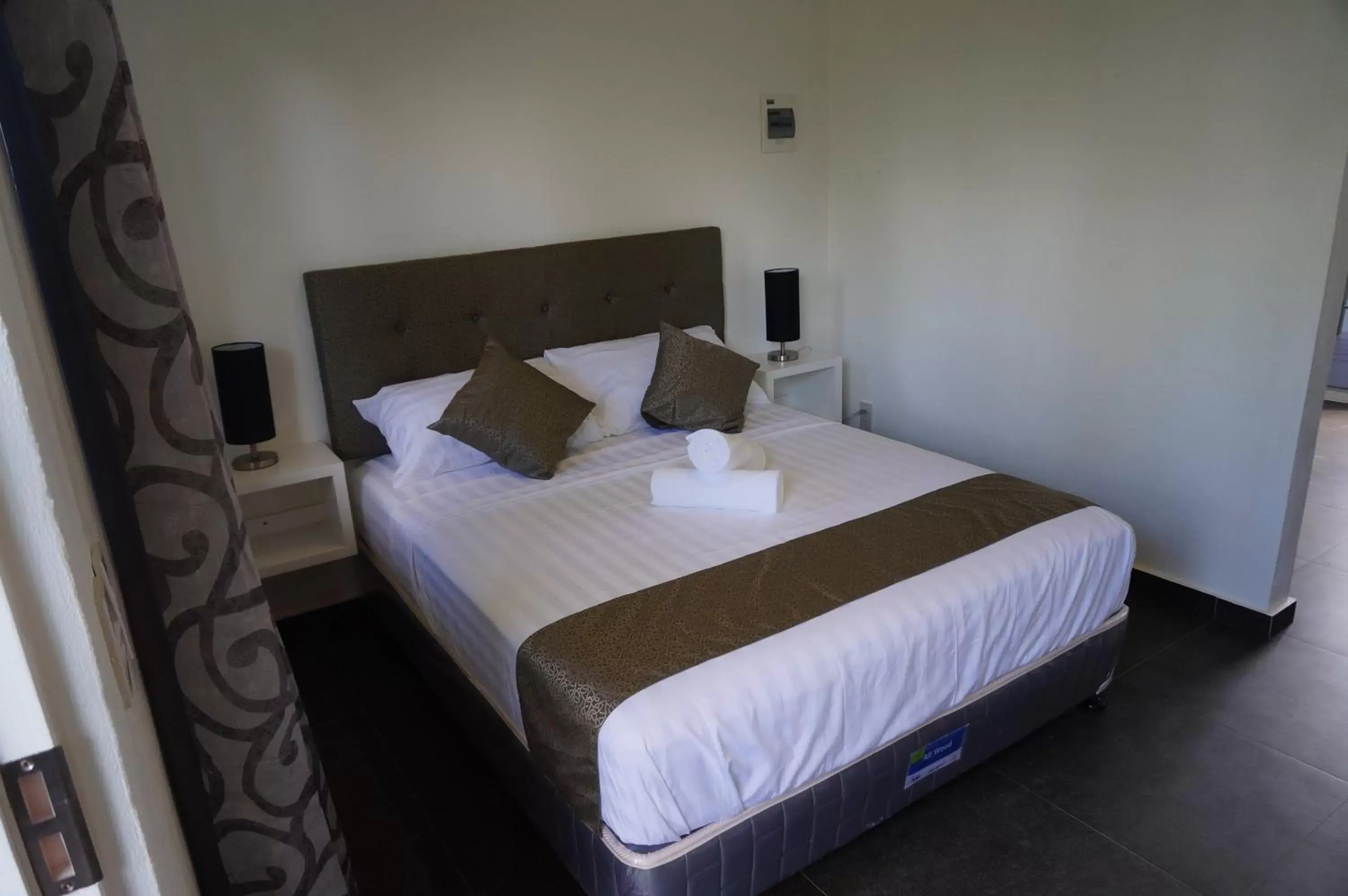 Bed in Malinawon Resort
