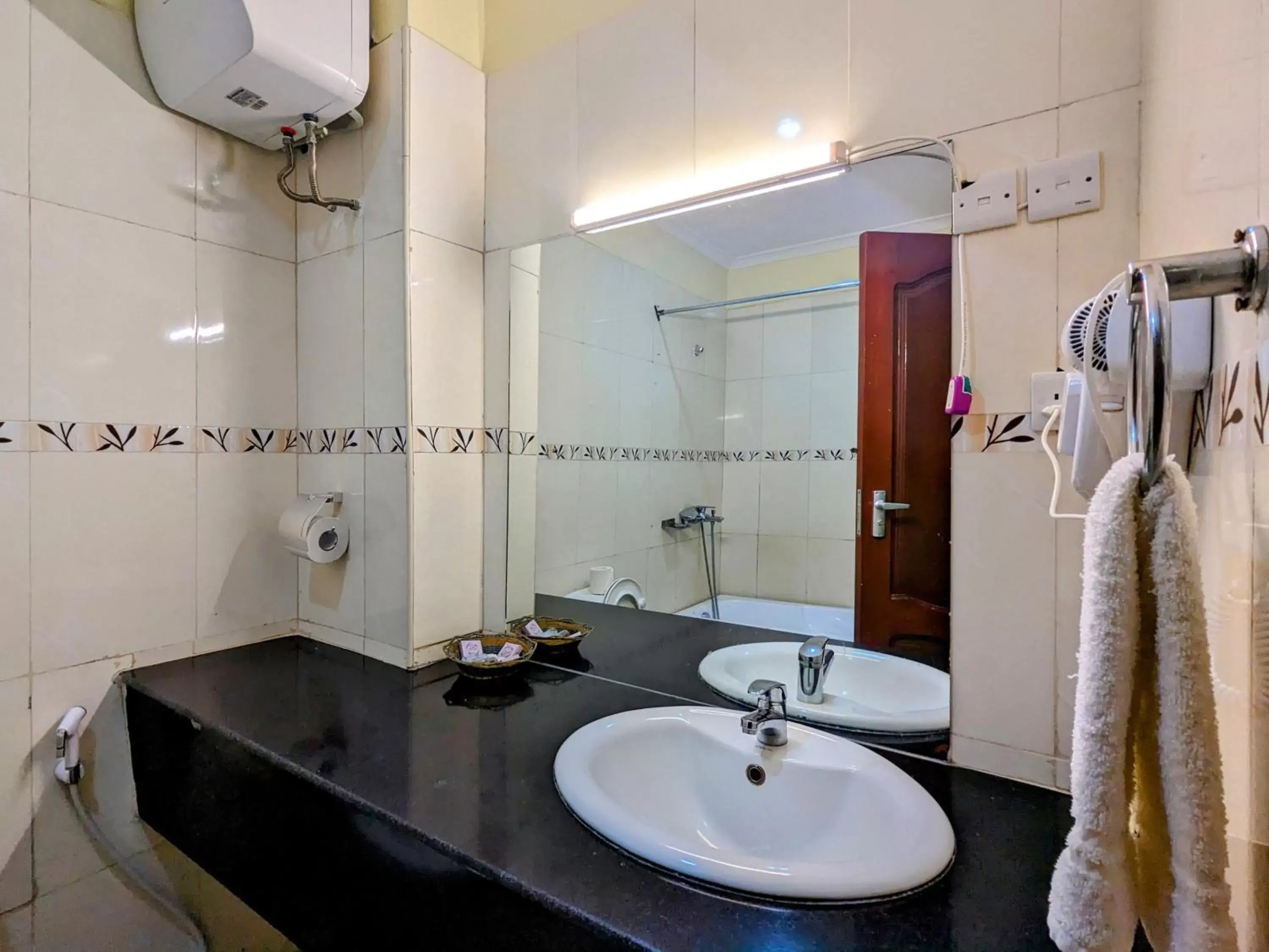 Shower, Bathroom in Mvuli Hotels Arusha
