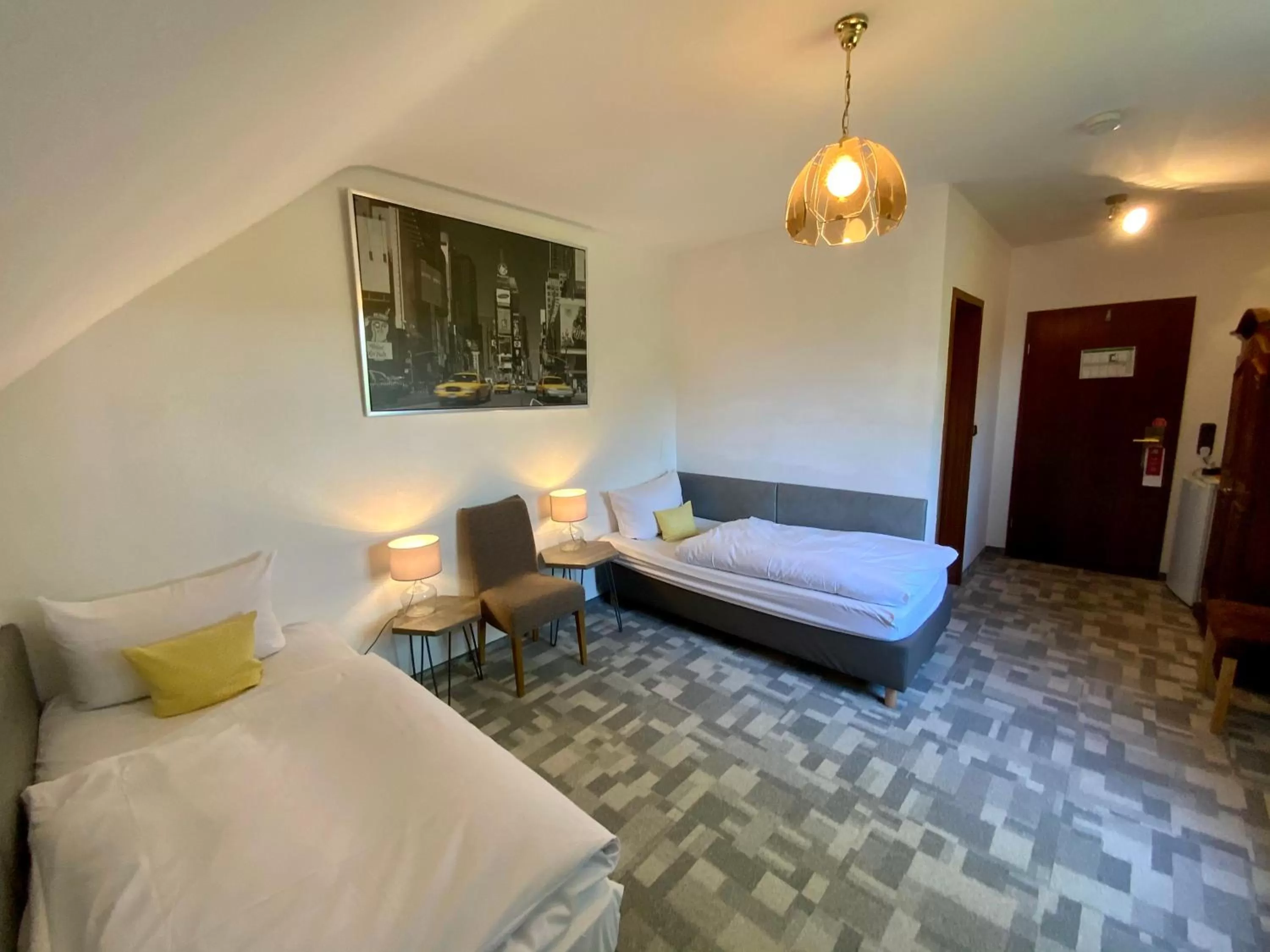 Bed in Hotel Attaché