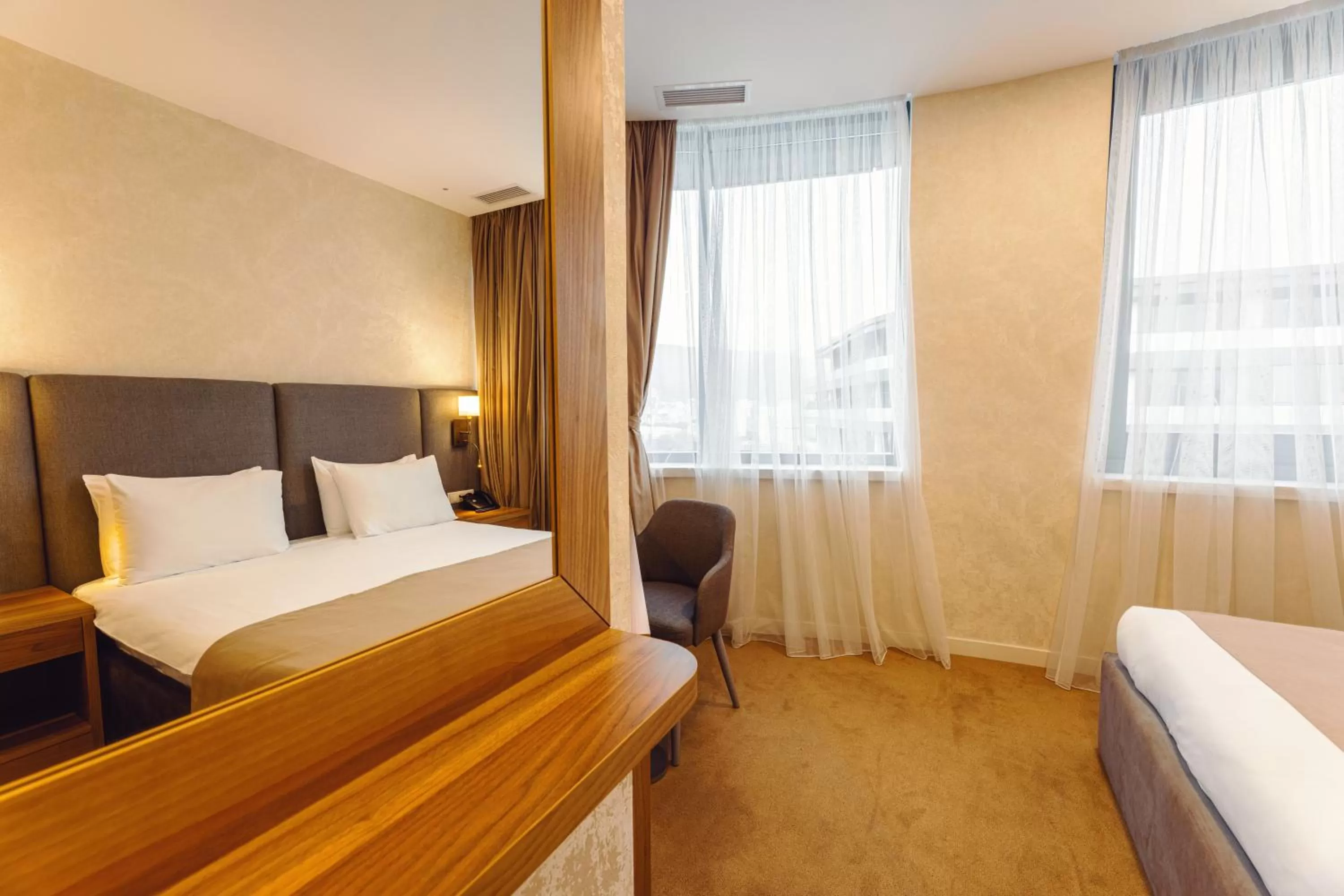 Bed in Meta Business Hotel By King David