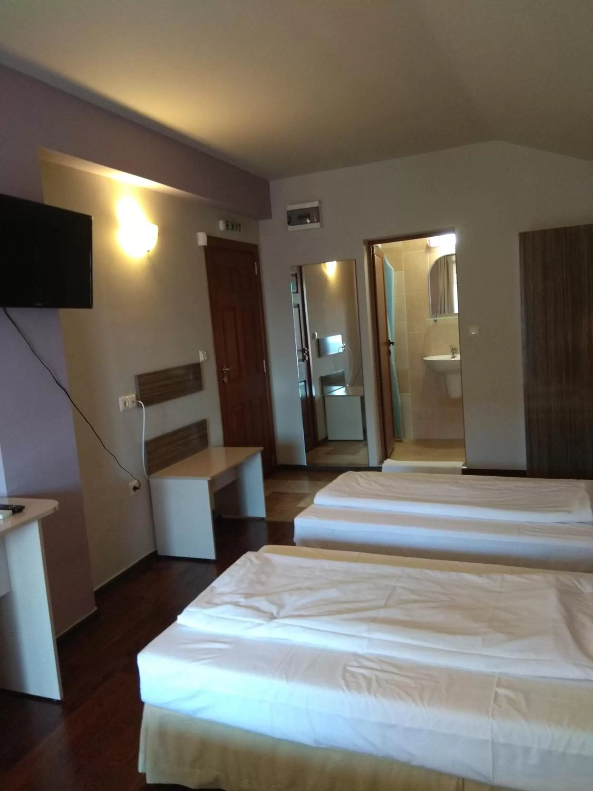 Bed in Roots Hotel and Wine Bar