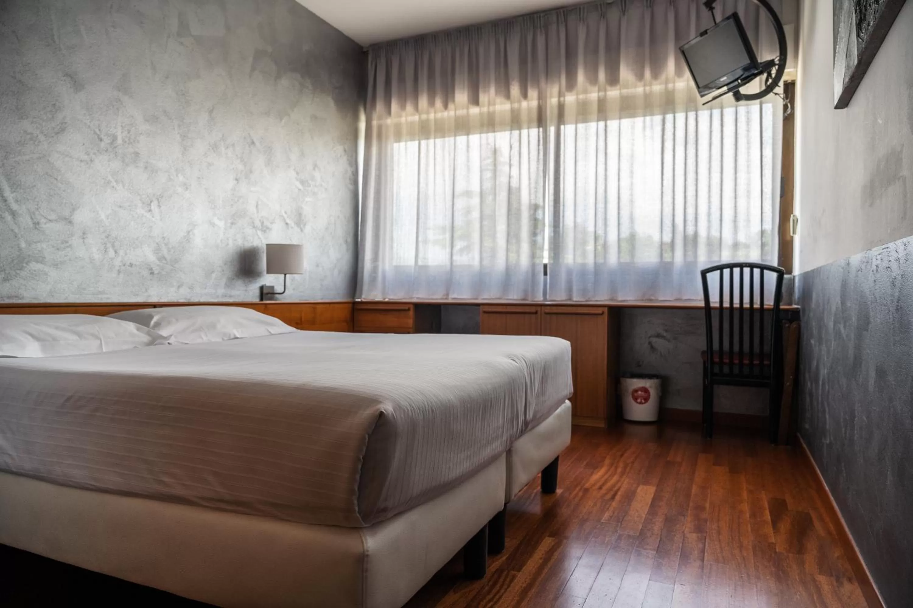 Bed in Hotel Valpolicella International