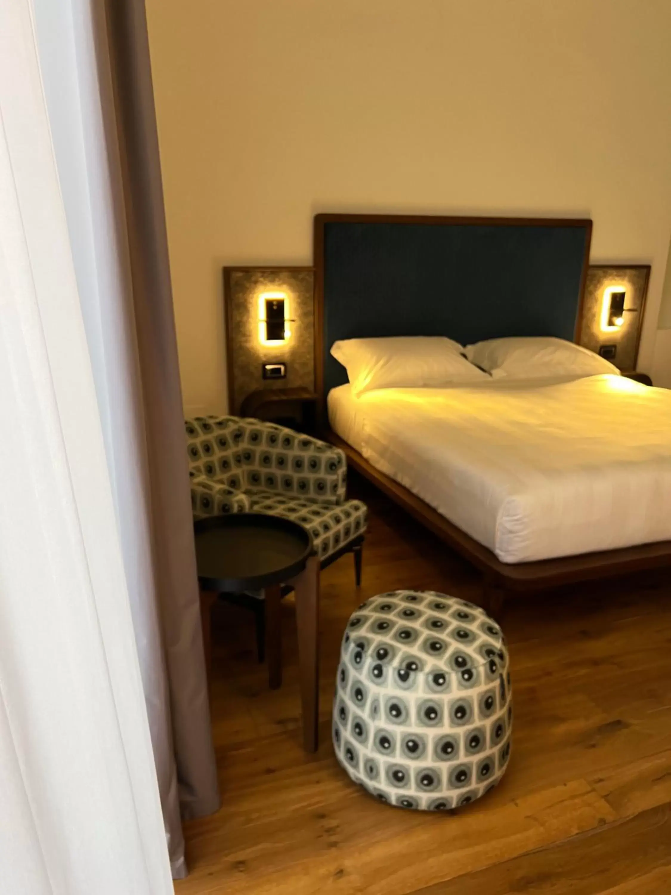 Bed in Lo Stemma Luxury Hotel