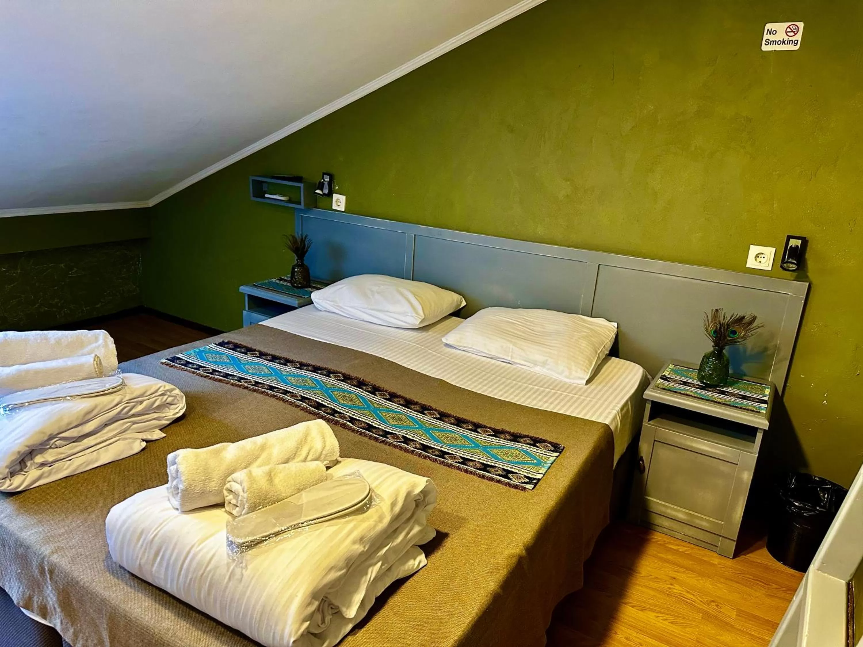 Bed in Kindli Boutique Hotel