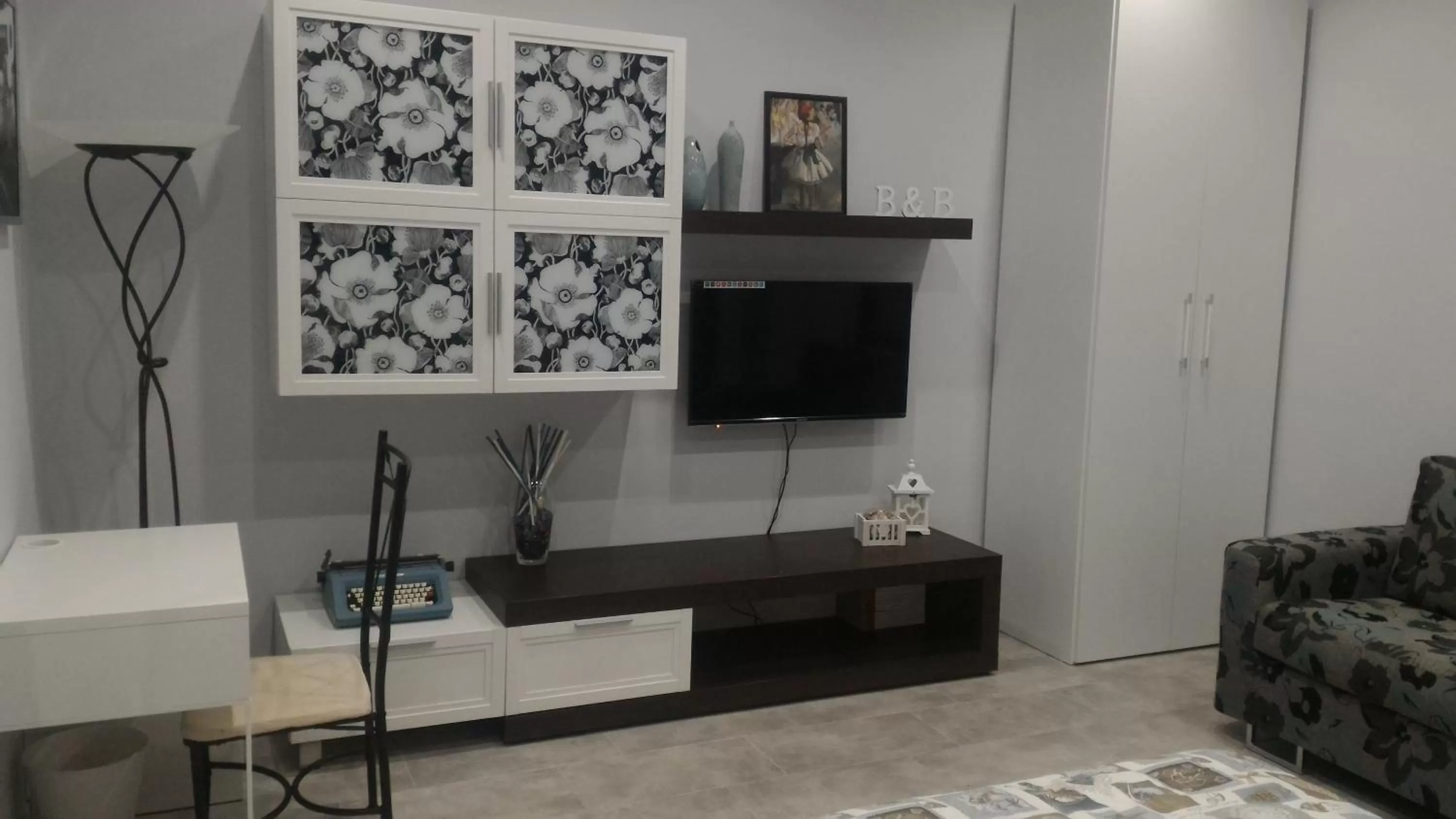 Communal lounge/ TV room in B&B A casa dell'artista