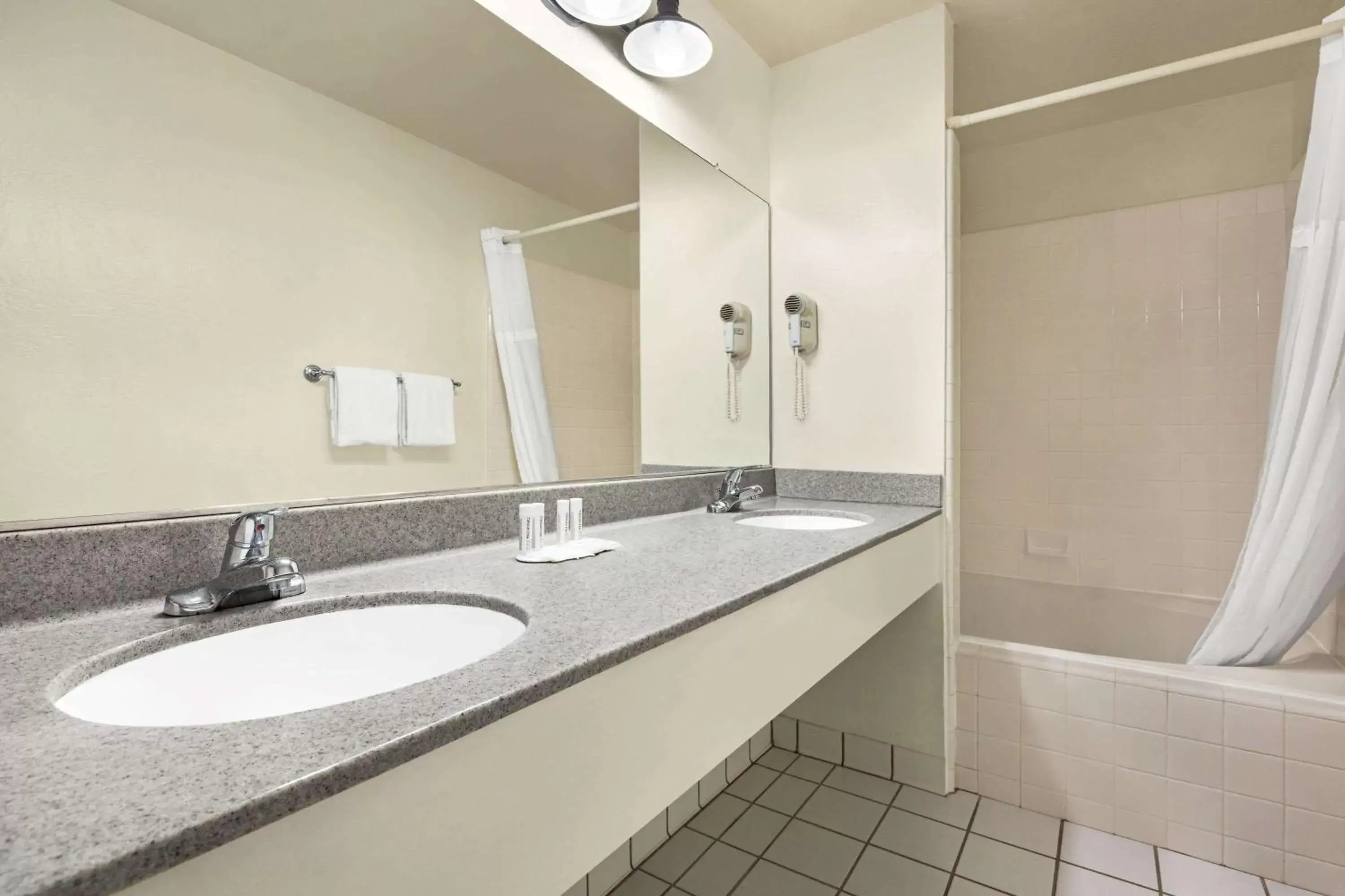 Bathroom in Baymont by Wyndham Fort Bragg