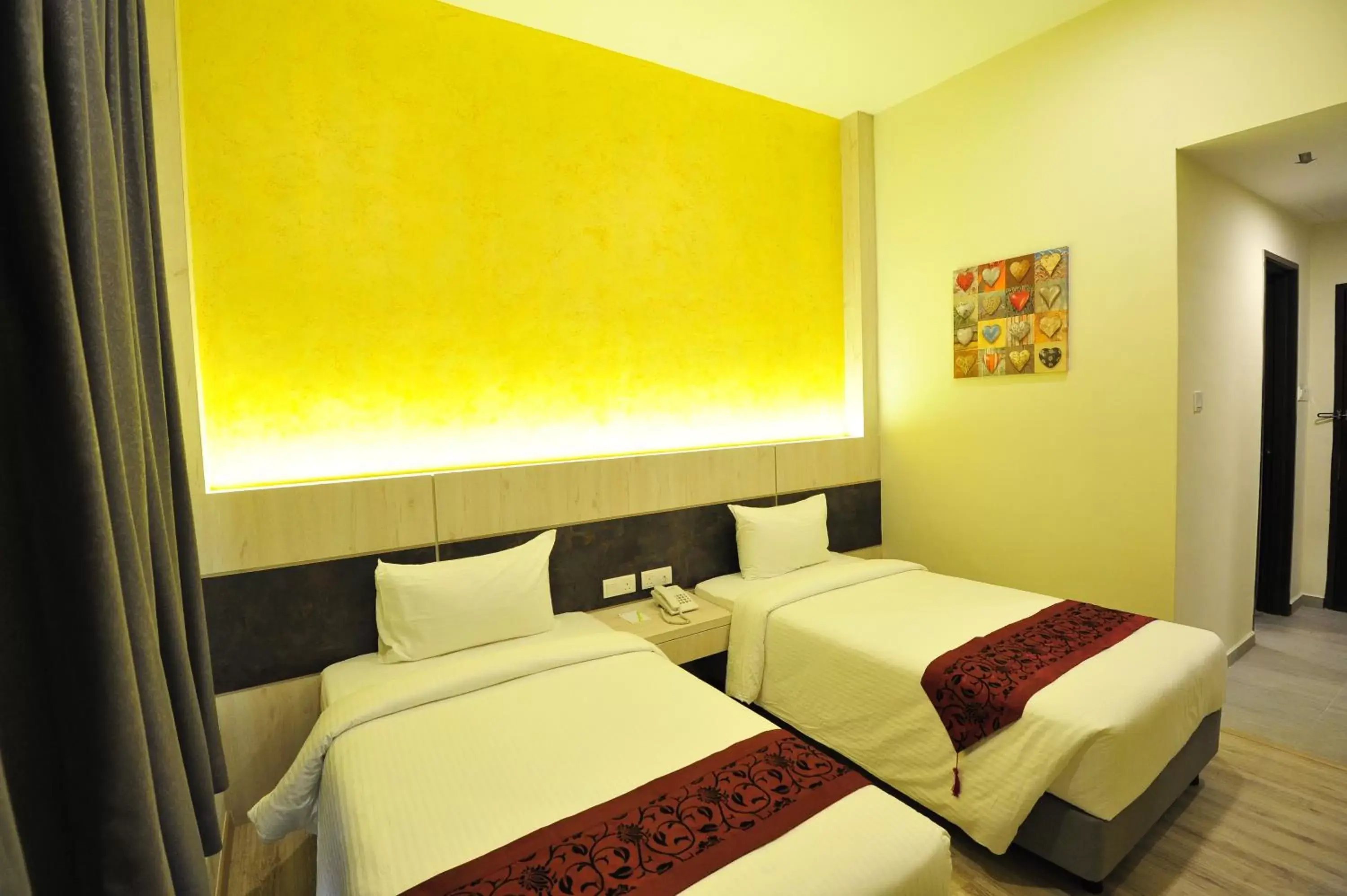 Bed in Marvelux Hotel