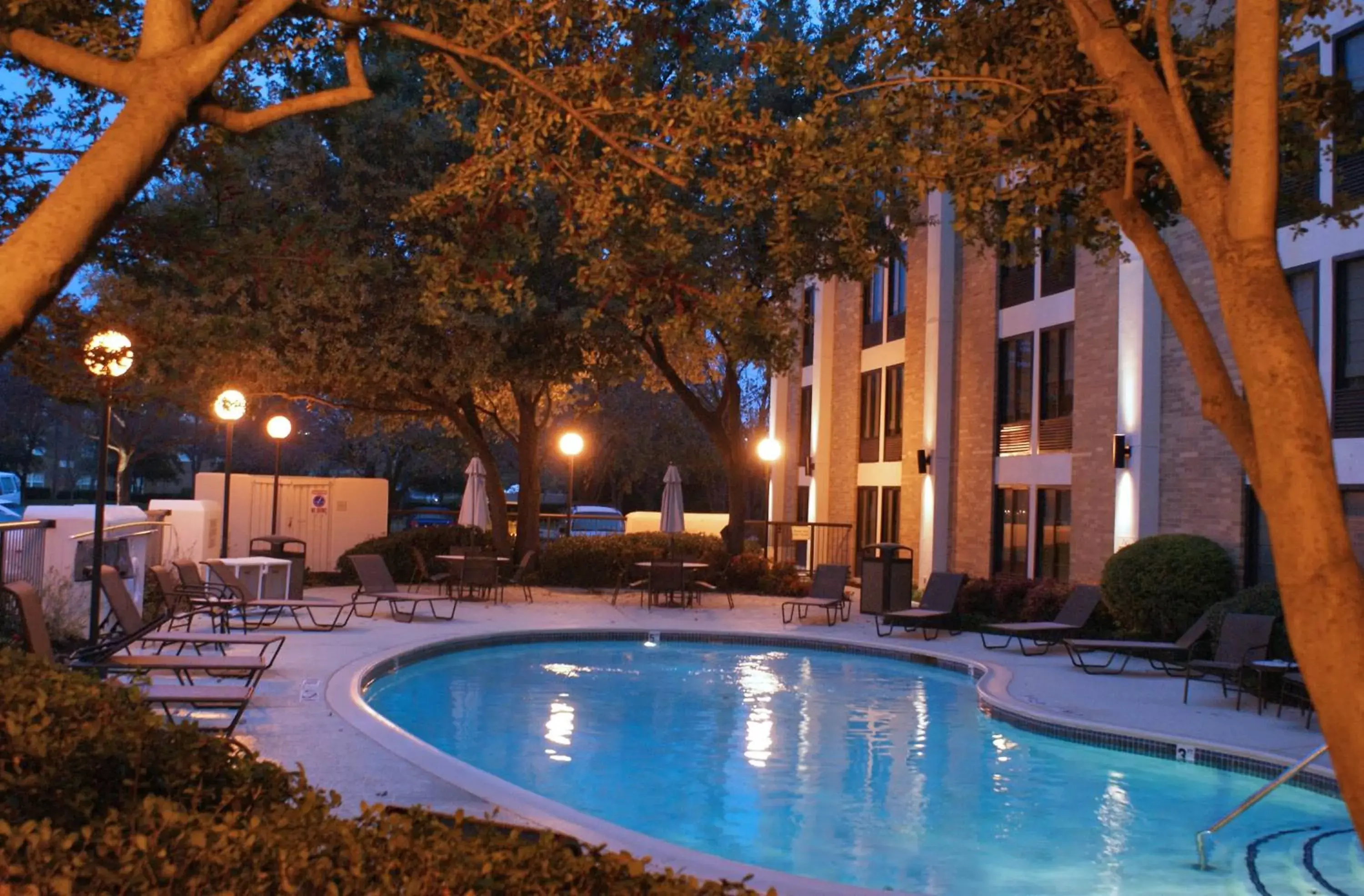 Swimming Pool in The Addison Hotel SureStay Collection by Best Western