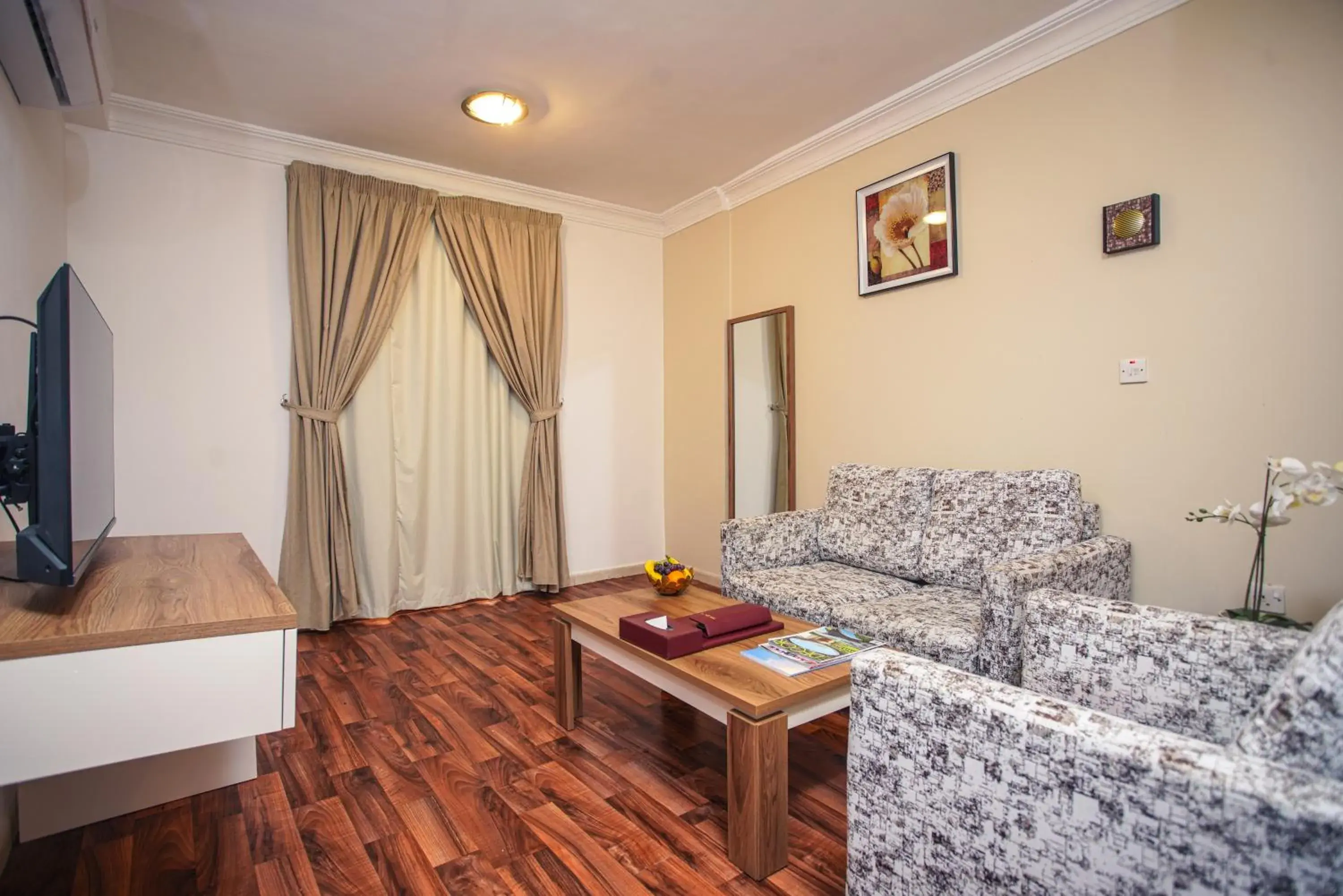 Bedroom, Seating Area in La Villa Suites Hotel