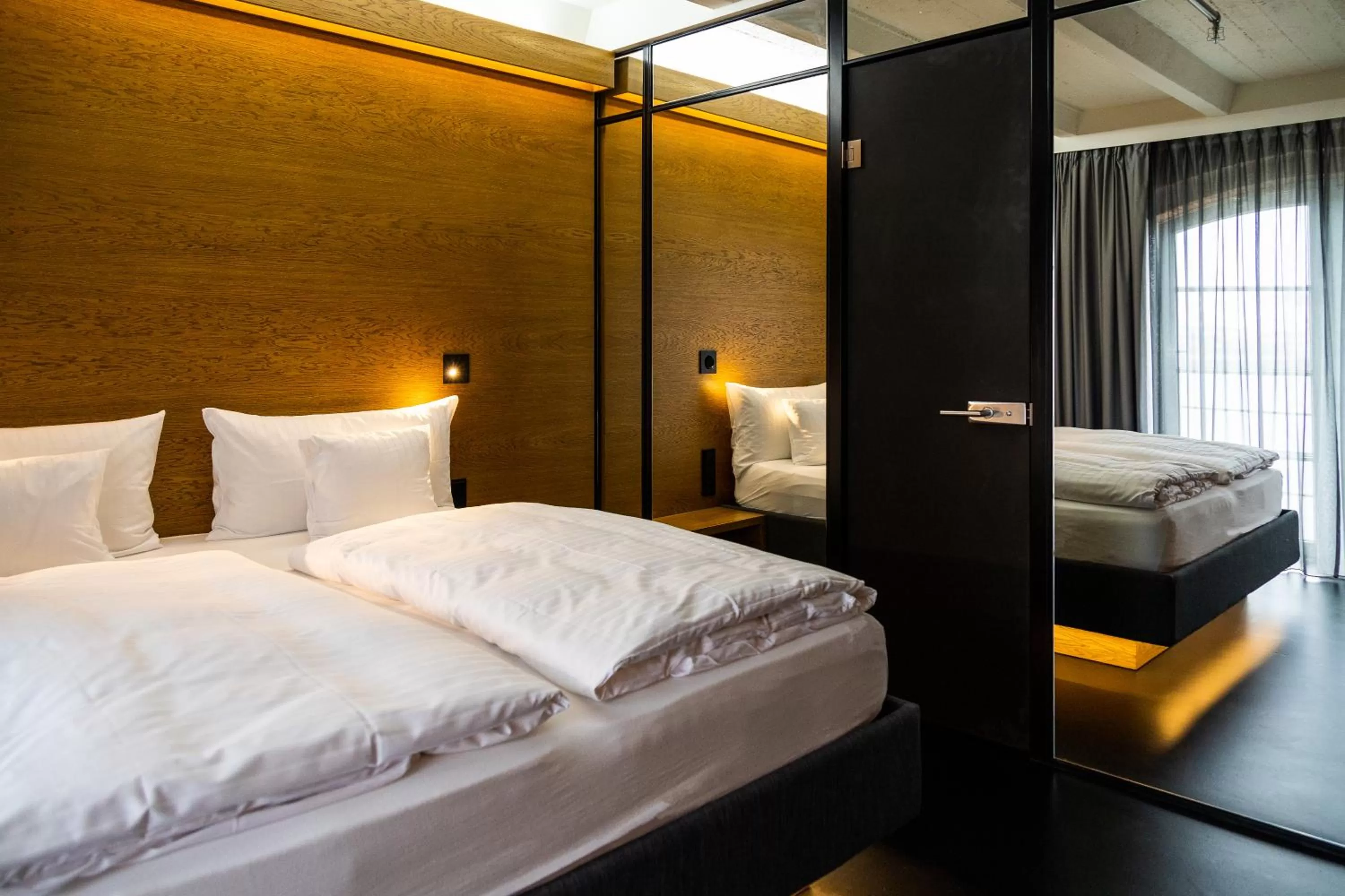 Photo of the whole room, Bed in GINN Hotel Hamburg Elbspeicher