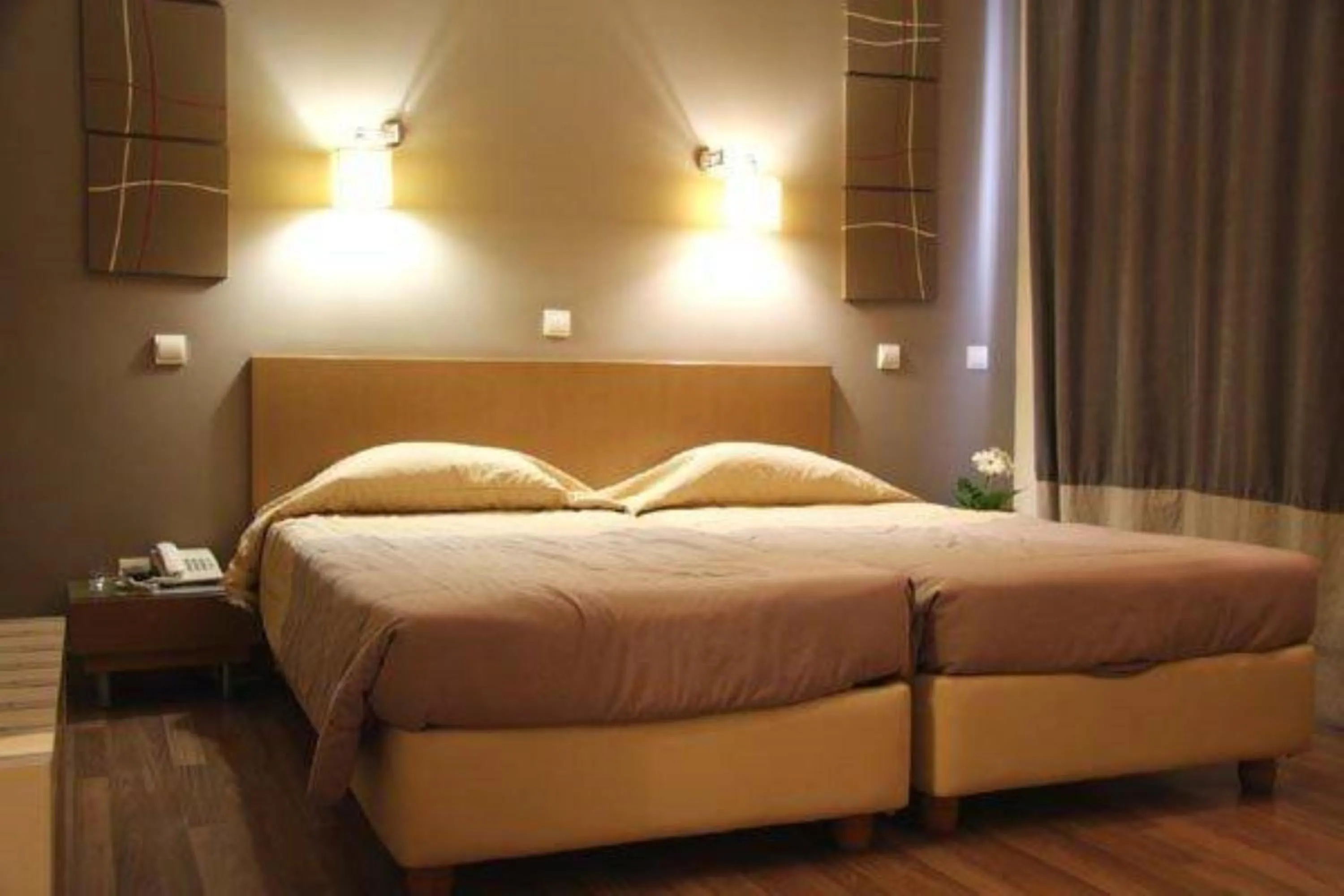 Bed in Ariston Hotel