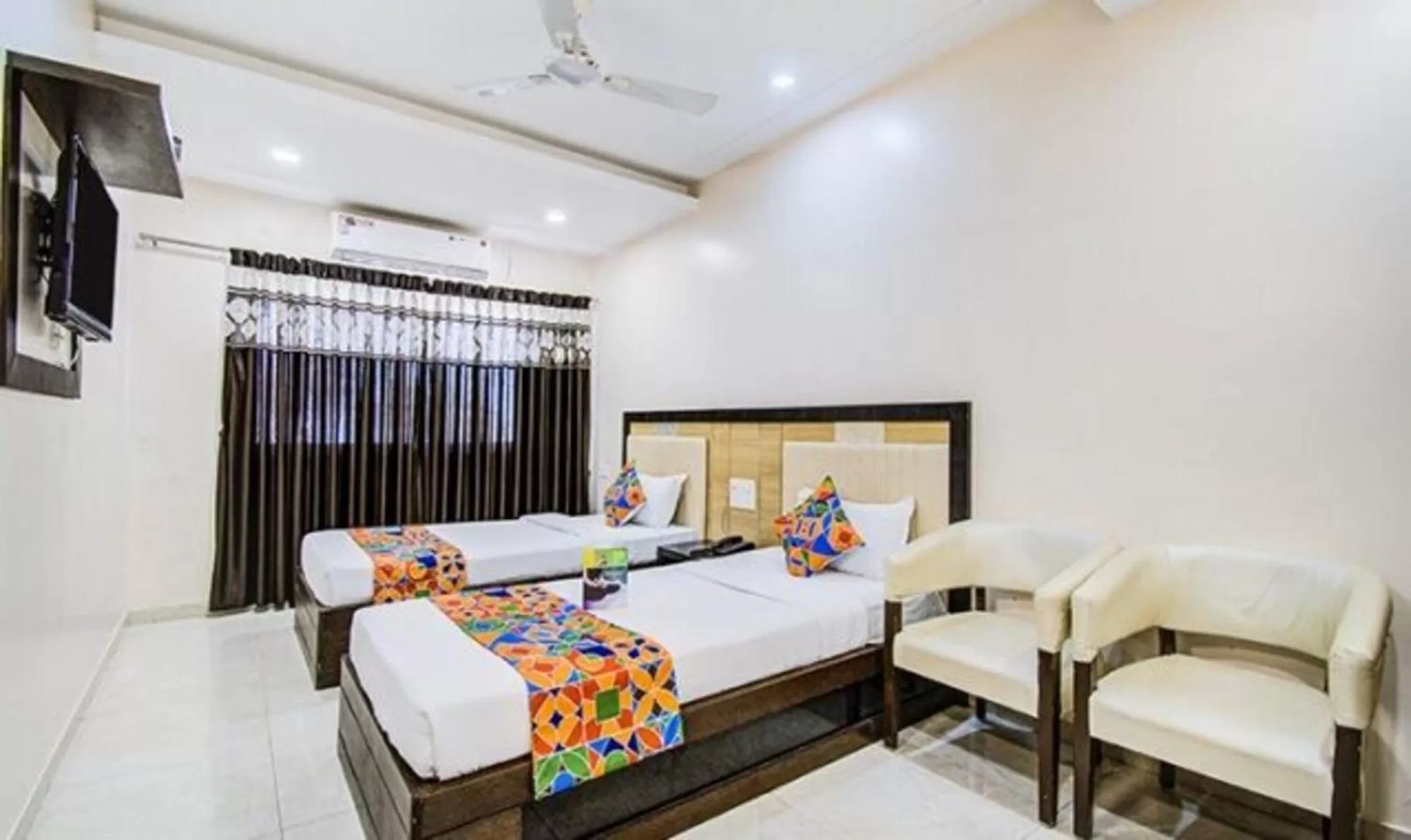 TV and multimedia, Bed in FabHotel Krishna Regency