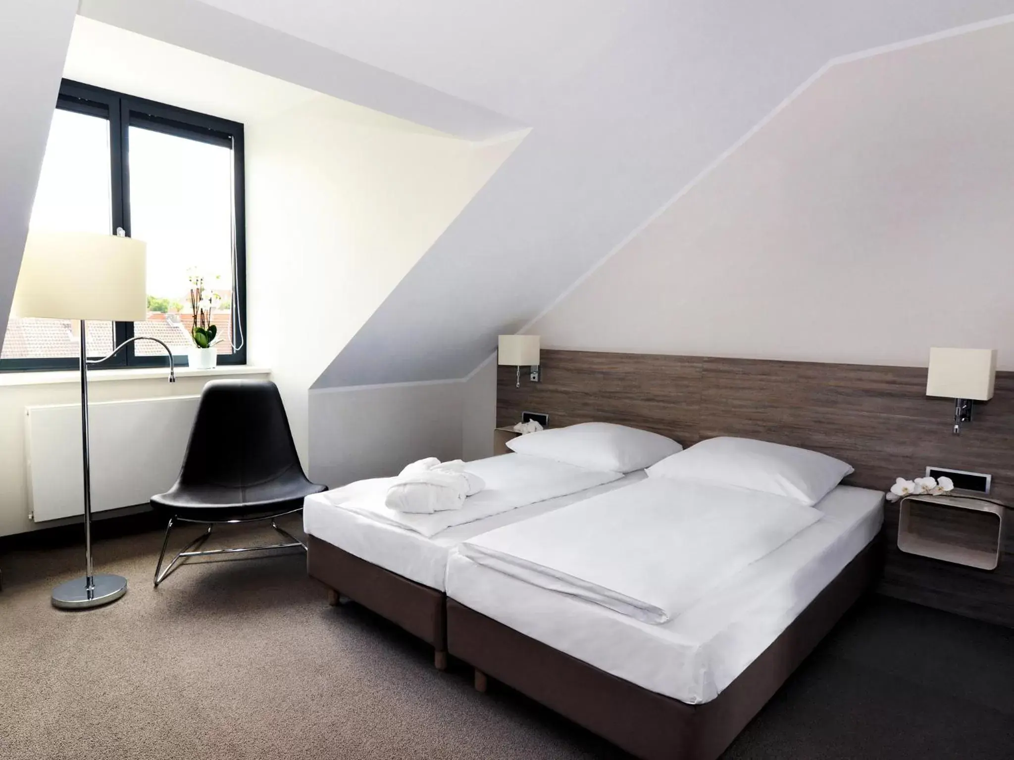 Bed in Hotel Schweizer Hof