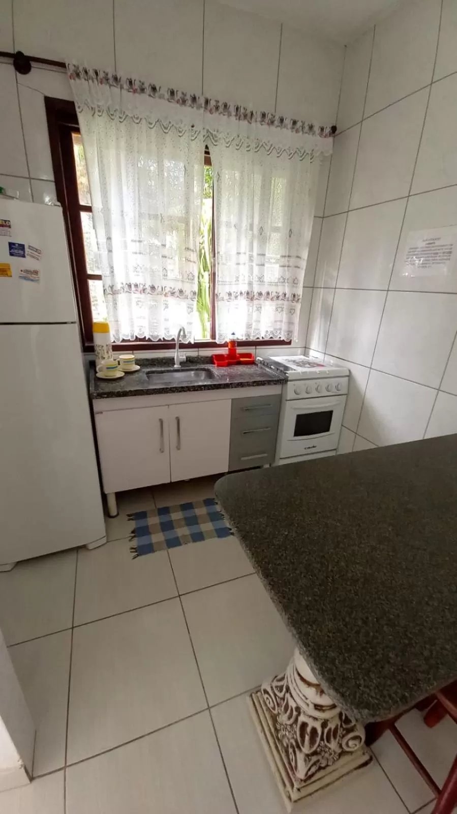 Kitchen/Kitchenette in Pousada Recanto Das Emerências