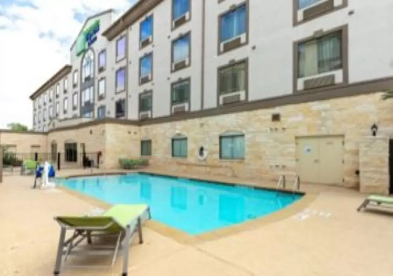 Swimming pool, Property Building in Holiday Inn Express & Suites Houston South - Near Pearland, an IHG Hotel